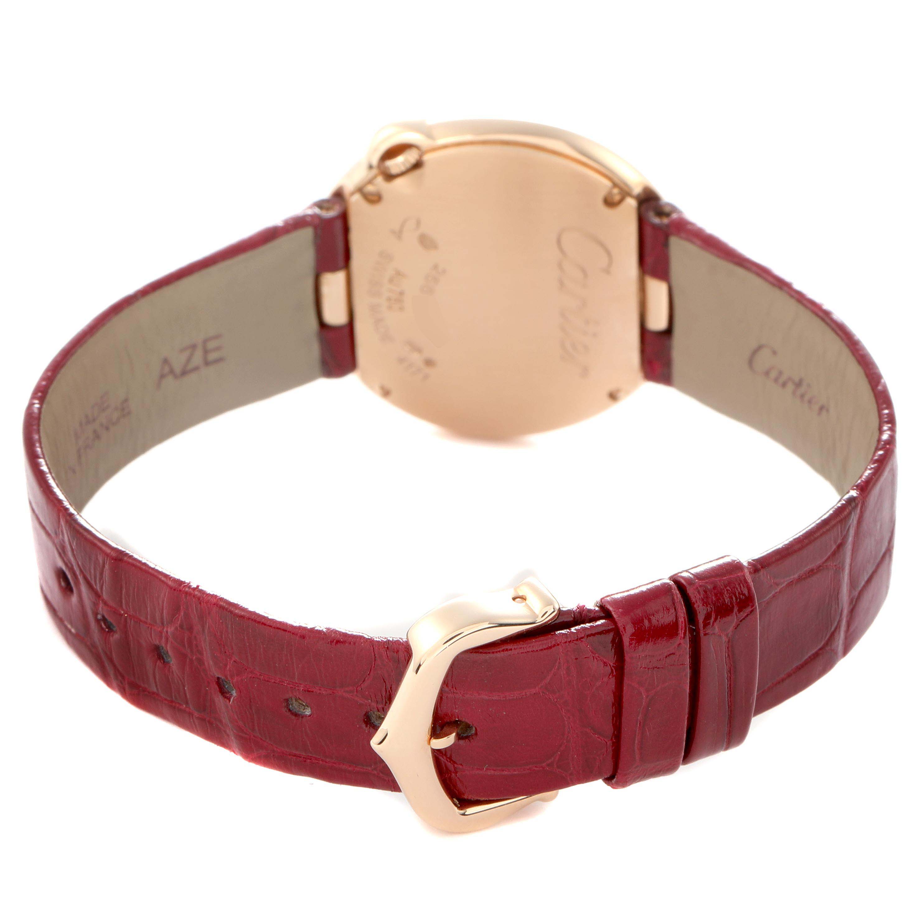 The image shows the back view of the Cartier Ballon Blanc WJBL0005 Women's Rose Gold Silver Dial watch, highlighting the clasp and red leather strap.