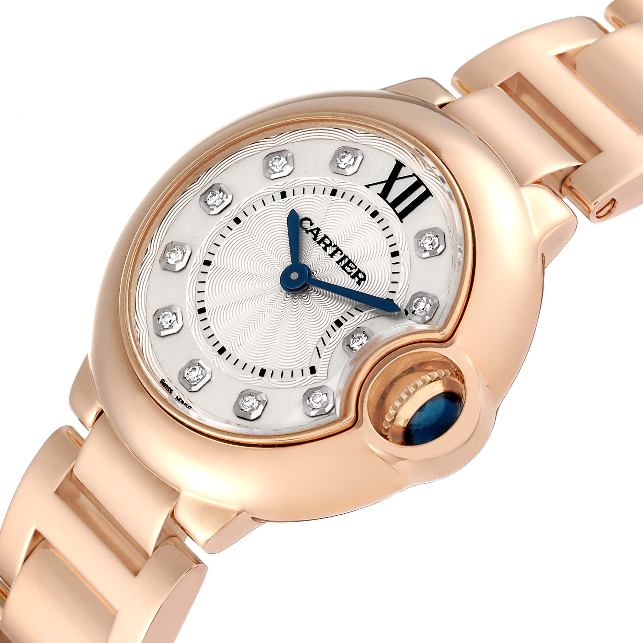 The image shows a close-up of a Cartier Ballon Bleu WE902025 Women's Rose Gold Silver Dial WE902025 Women's Rose Gold Silver Dial watch, highlighting the face, blue hands, and part of the bracelet.