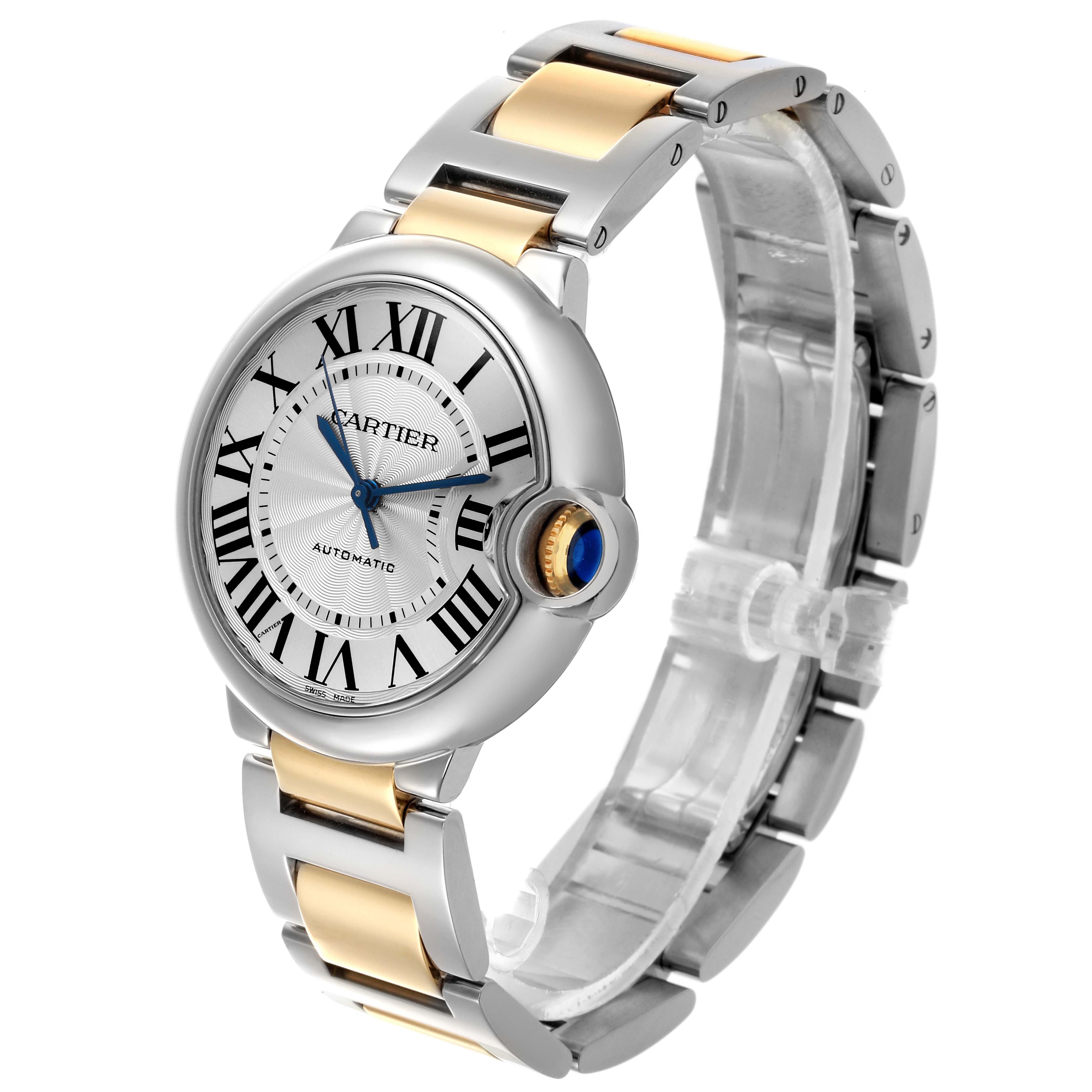 The image shows a Cartier Ballon Bleu W2BB0012 Women's Steel and Gold (two tone) Silver Dial W2BB0012 Women's Steel and Gold (two tone) Silver Dial watch at a three-quarter view, highlighting its face, bezel, and two-tone bracelet.