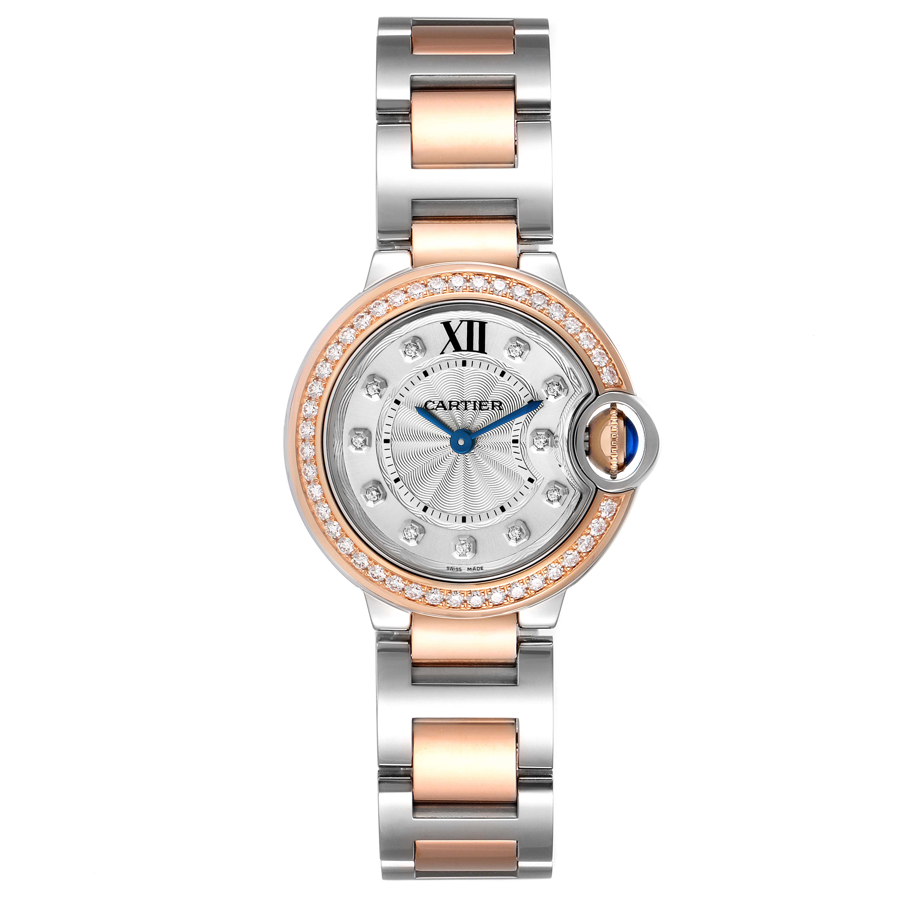 The image shows a Cartier Ballon Bleu W3BB0009 Women's Steel and Gold (two tone) Silver Dial W3BB0009 Women's Steel and Gold (two tone) Silver Dial watch from a top-down angle, highlighting its dial, bezel, and two-tone bracelet.