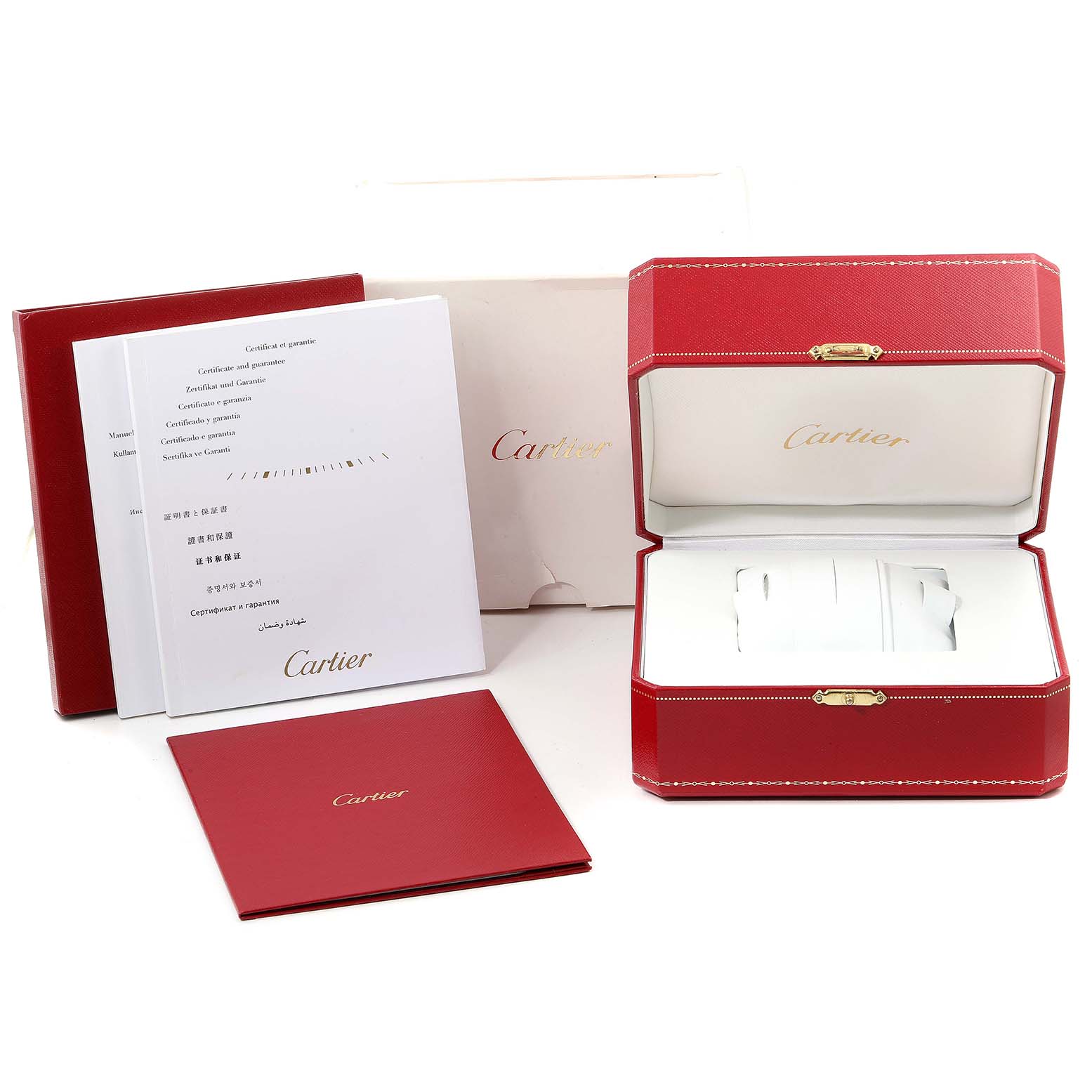 The image shows the packaging, warranty booklet, and open watch box for a Calibre de Cartier model by Cartier.