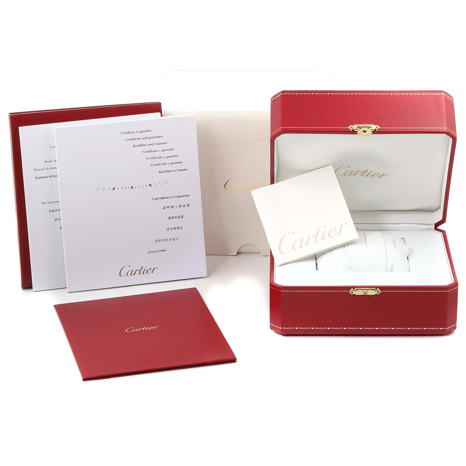 The image shows the packaging and documentation for a Calibre de Cartier model by Cartier, including a red watch box and various papers.