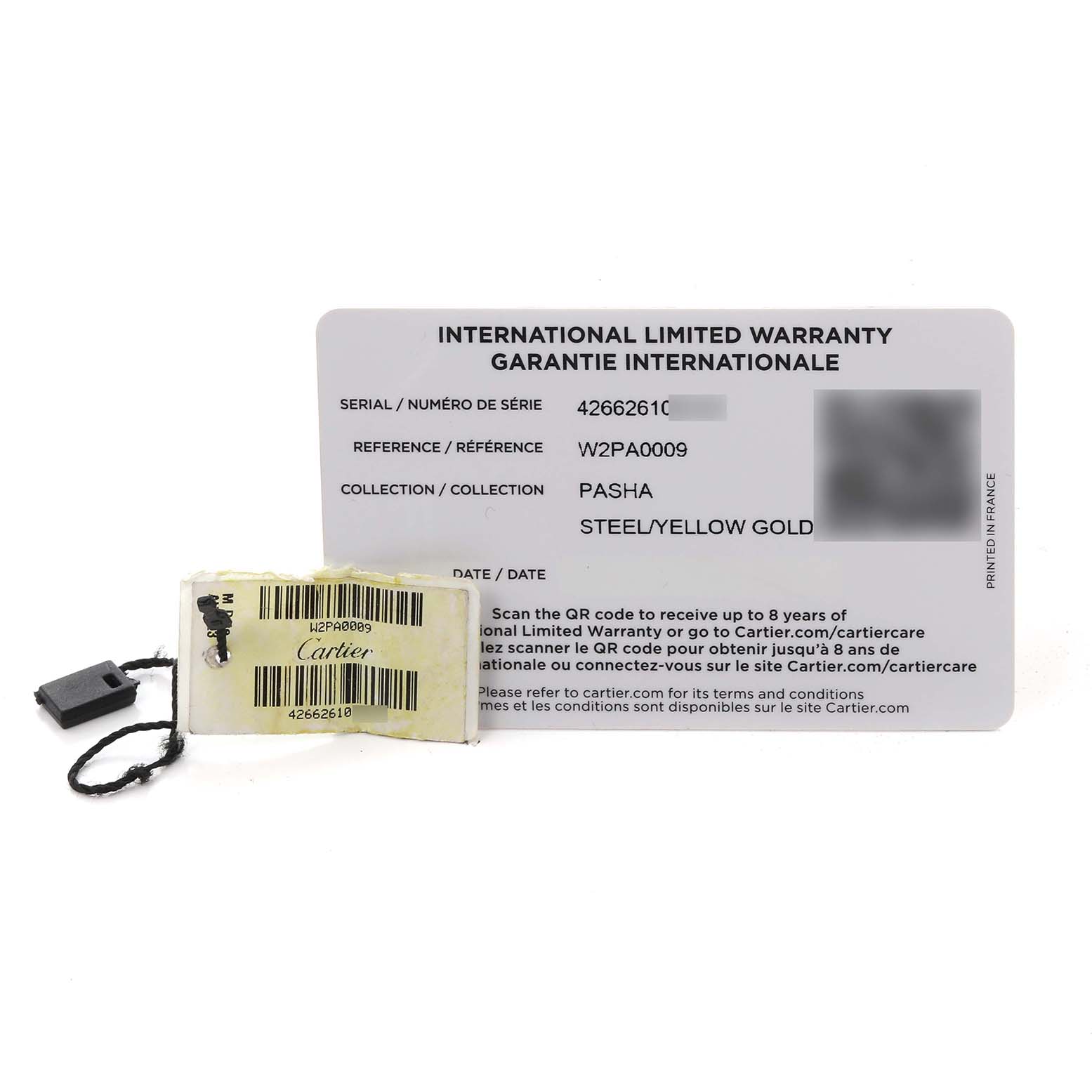The image shows the warranty card and tag for a Cartier Pasha W2PA0009 Men's Steel and Gold (two tone) Silver Dial W2PA0009 Men's Steel and Gold (two tone) Silver Dial watch, highlighting details like the serial and reference number.