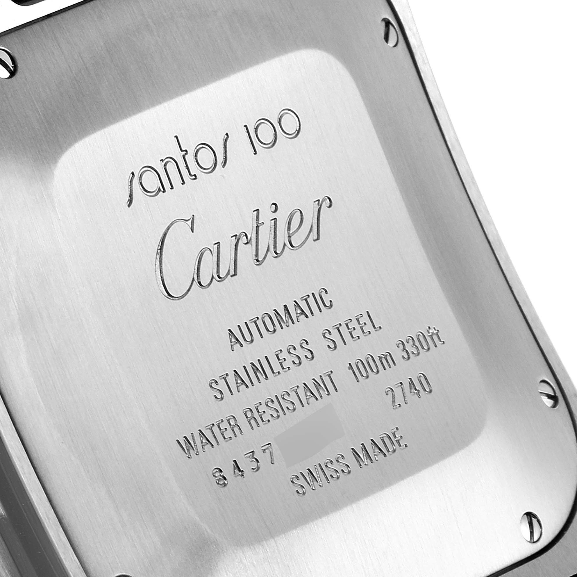The image shows the back case of a Santos model by Cartier, with engraved specifications and brand details.