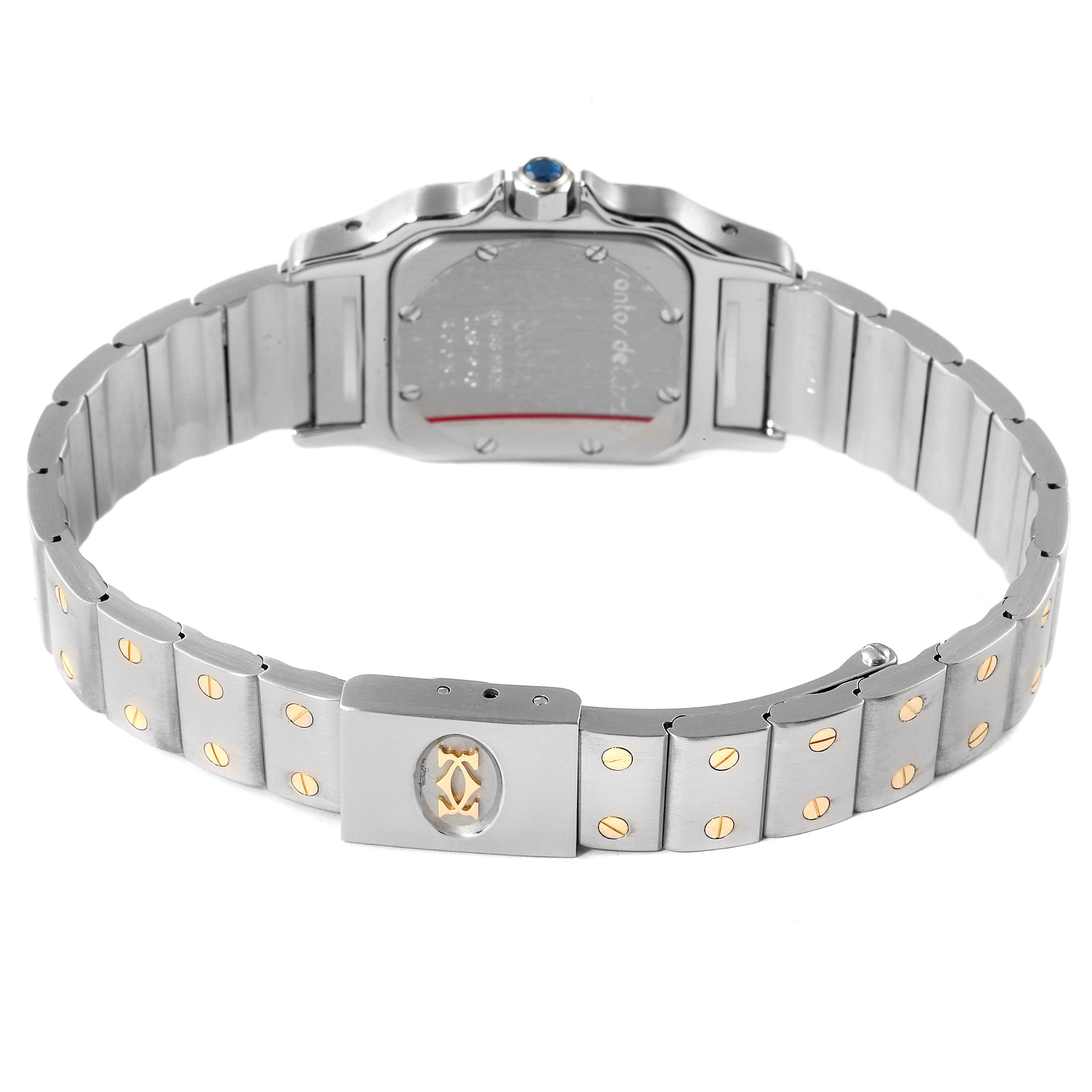 The image shows the back and bracelet of a Cartier Santos W20012C4 Women's Steel and Gold (two tone) Silver Dial W20012C4 Women's Steel and Gold (two tone) Silver Dial watch, emphasizing the clasp and links.