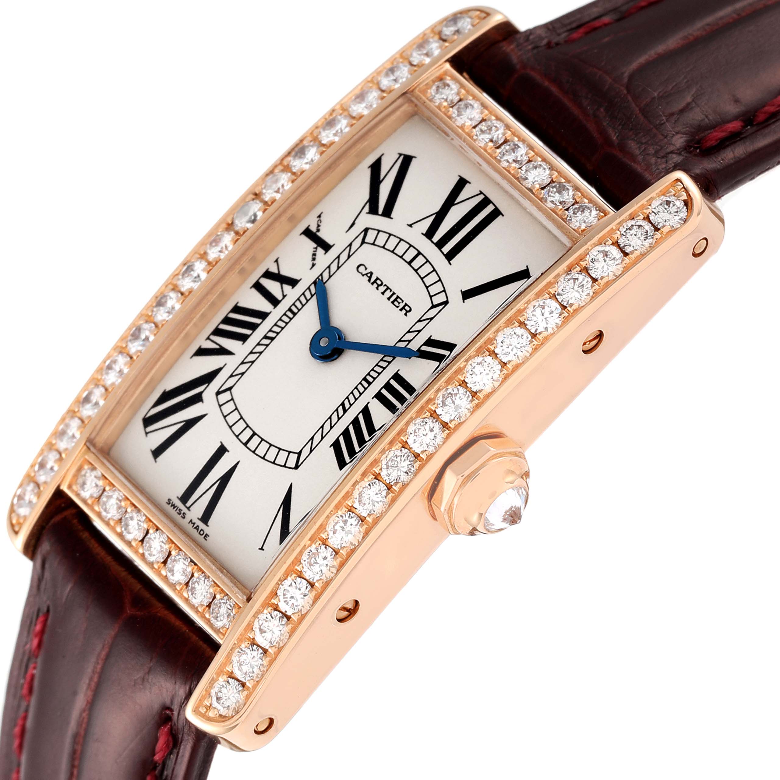 The image shows a tilted side view of a Cartier Tank Americaine WJTA0002 Women's Rose Gold Silver Dial WJTA0002 Women's Rose Gold Silver Dial watch, highlighting its bezel, crown, and leather strap.