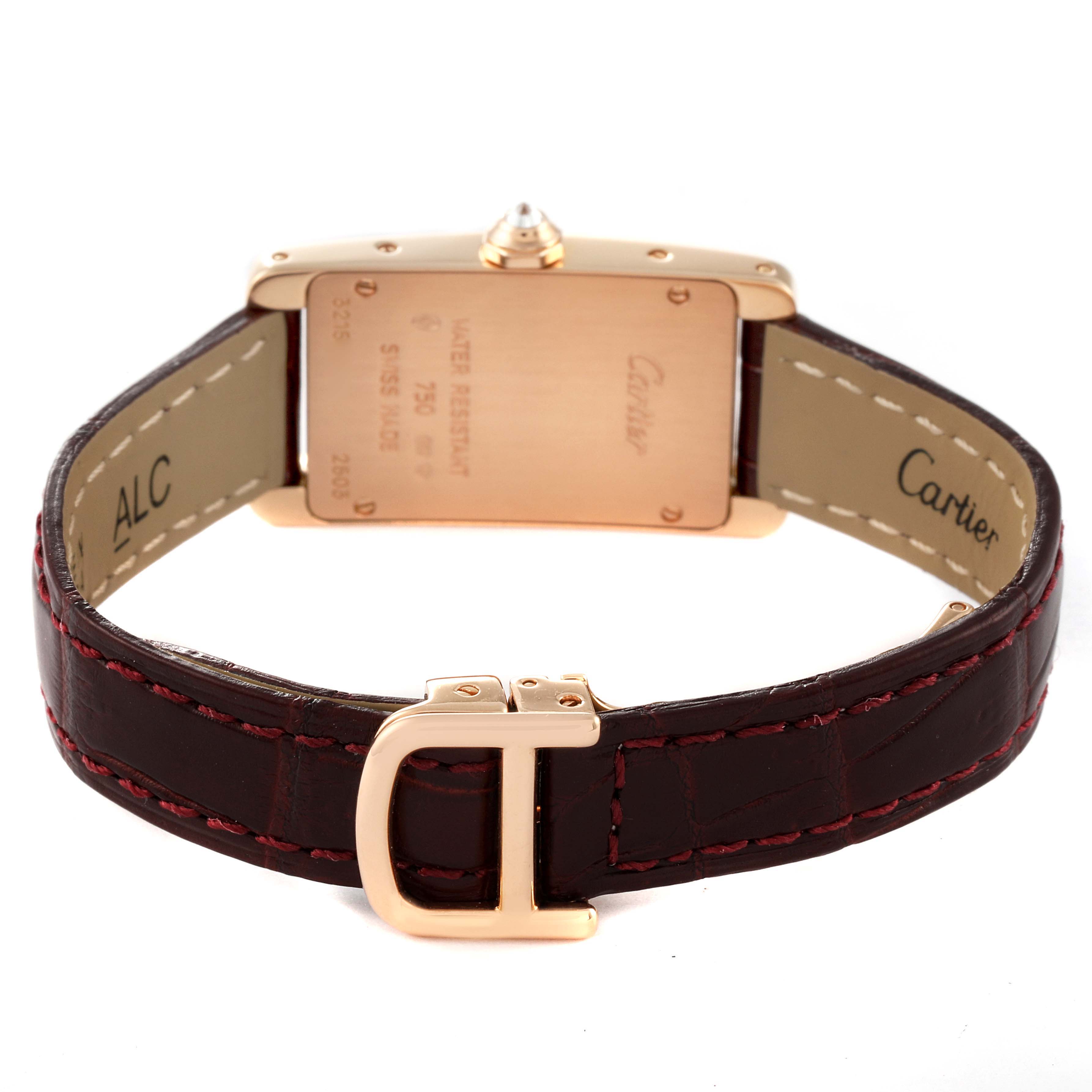 This image shows the back and clasp of a Cartier Tank Américaine watch, highlighting the strap and case back details.