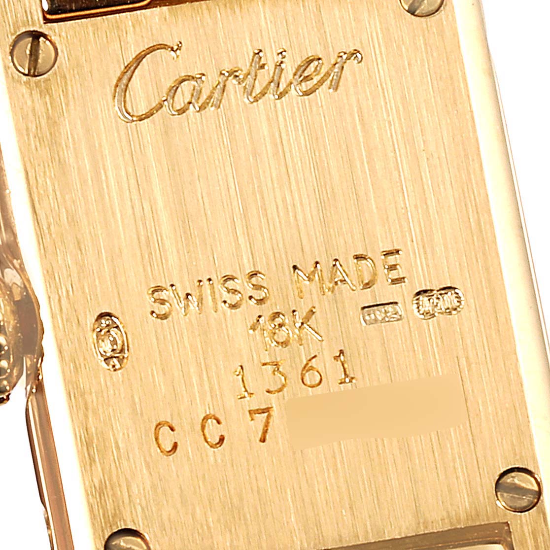 The image shows the back case of a Cartier Tank Classic 1361 Women's Yellow Gold Silver Dial 1361 Women's Yellow Gold Silver Dial watch, highlighting branding and material details.