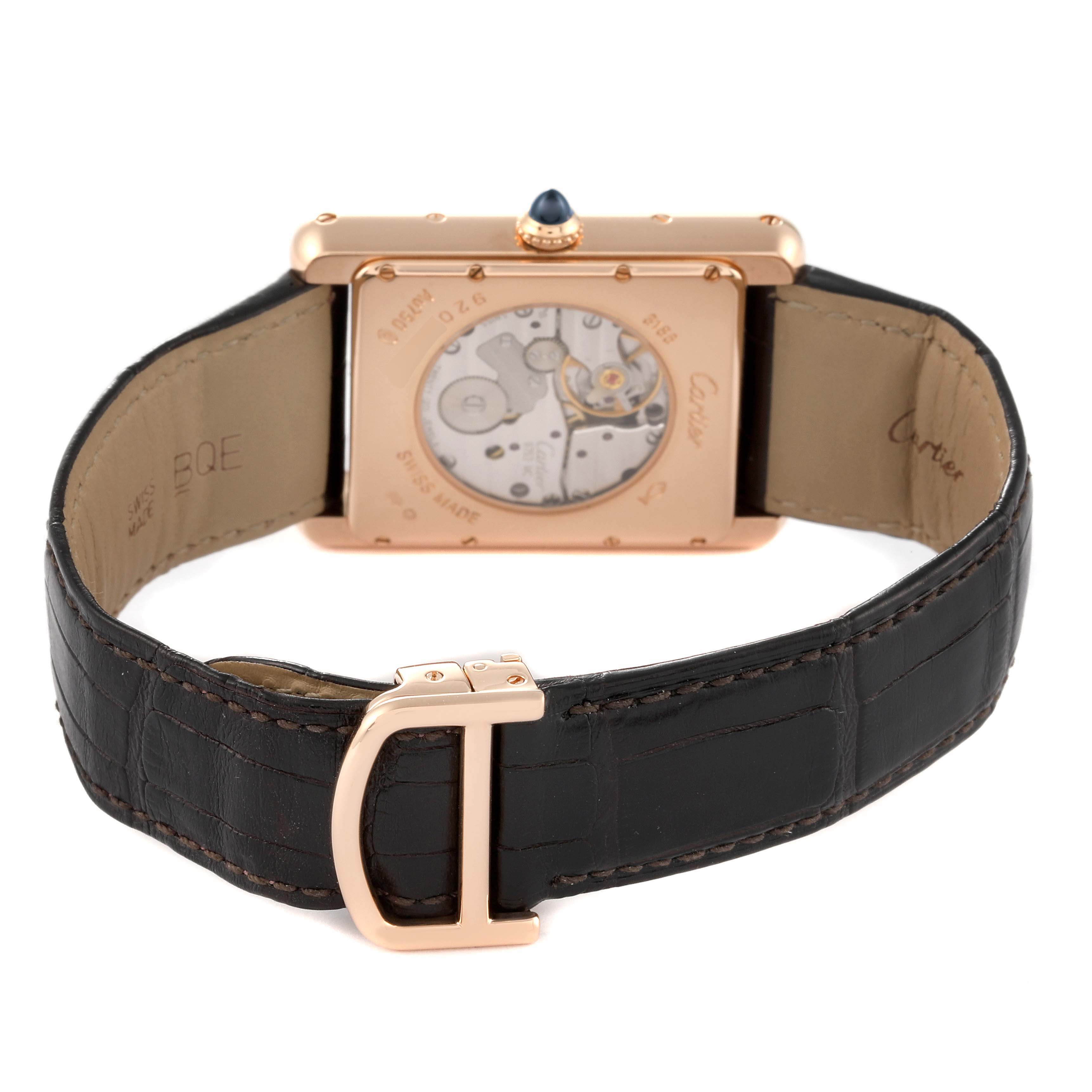 This image shows the back view and strap of the Tank Louis model by Cartier, highlighting the watch's mechanism and leather band.