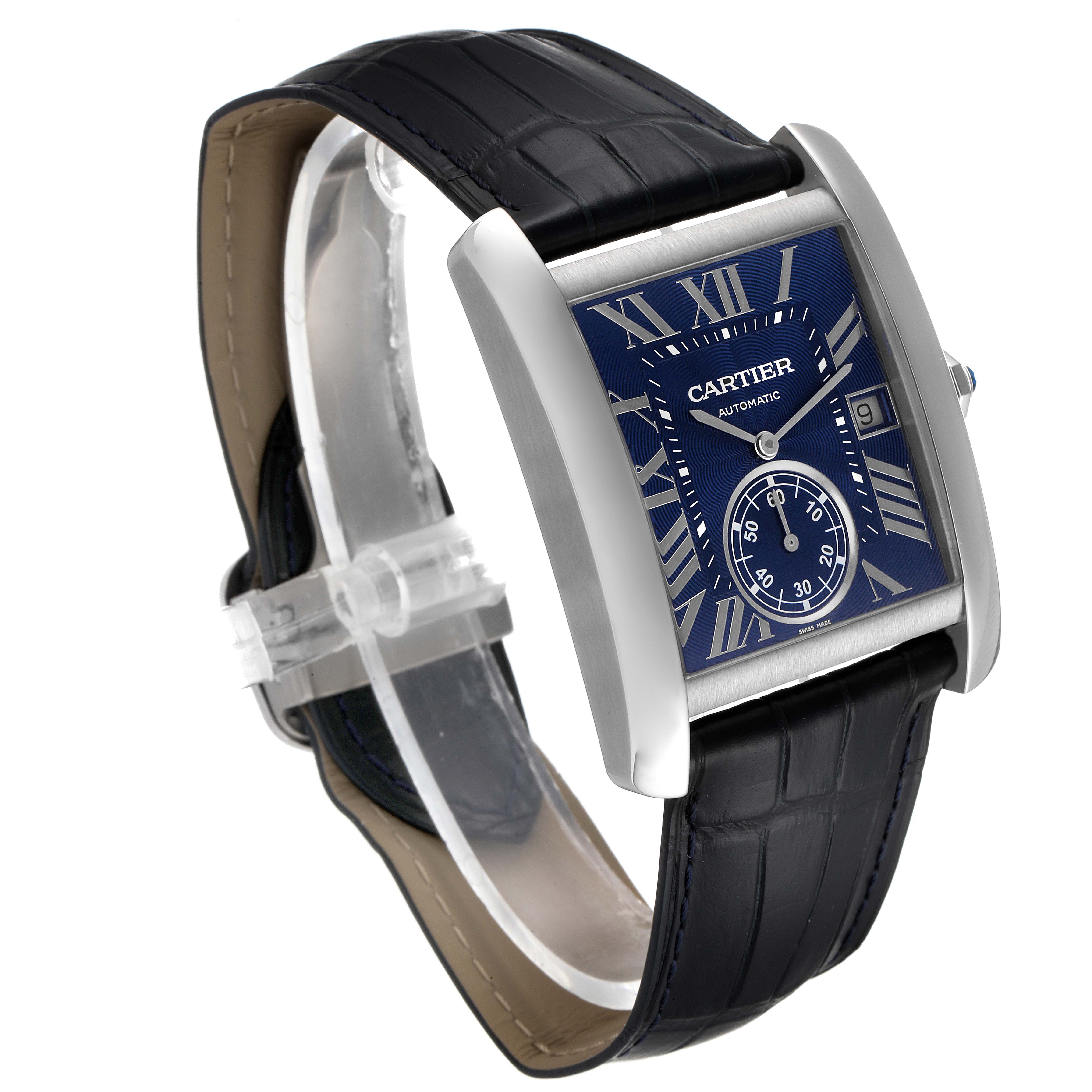 The Cartier Tank MC WSTA0010 Men's Stainless Steel Blue Dial WSTA0010 Men's Stainless Steel Blue Dial watch is shown at a three-quarter angle, displaying its blue dial, Roman numerals, and black leather strap.