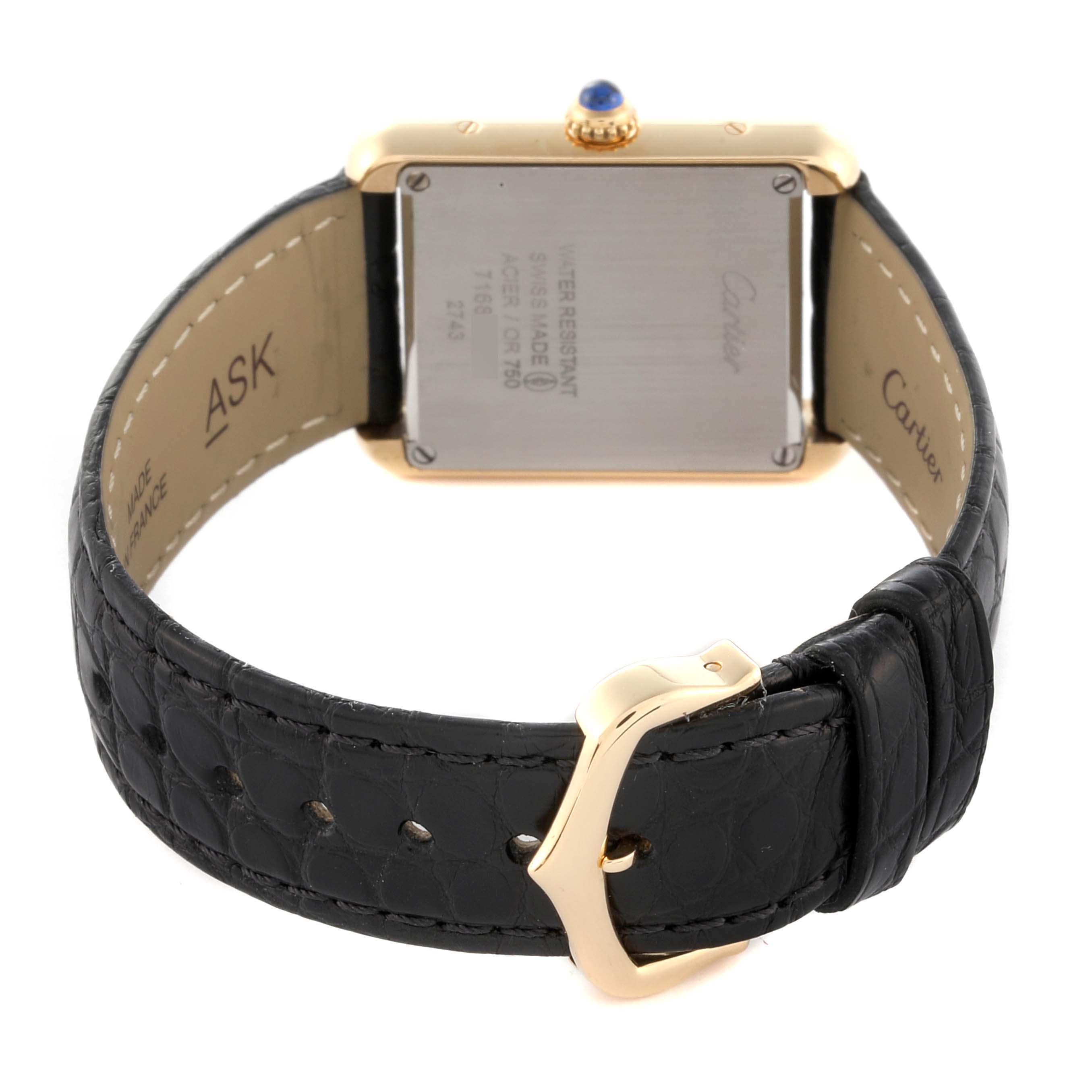 The Cartier Tank Solo W1018755 Women's Steel and Gold (two tone) Silver Dial W1018755 Women's Steel and Gold (two tone) Silver Dial watch is shown from the back, displaying the case back, strap, and buckle.