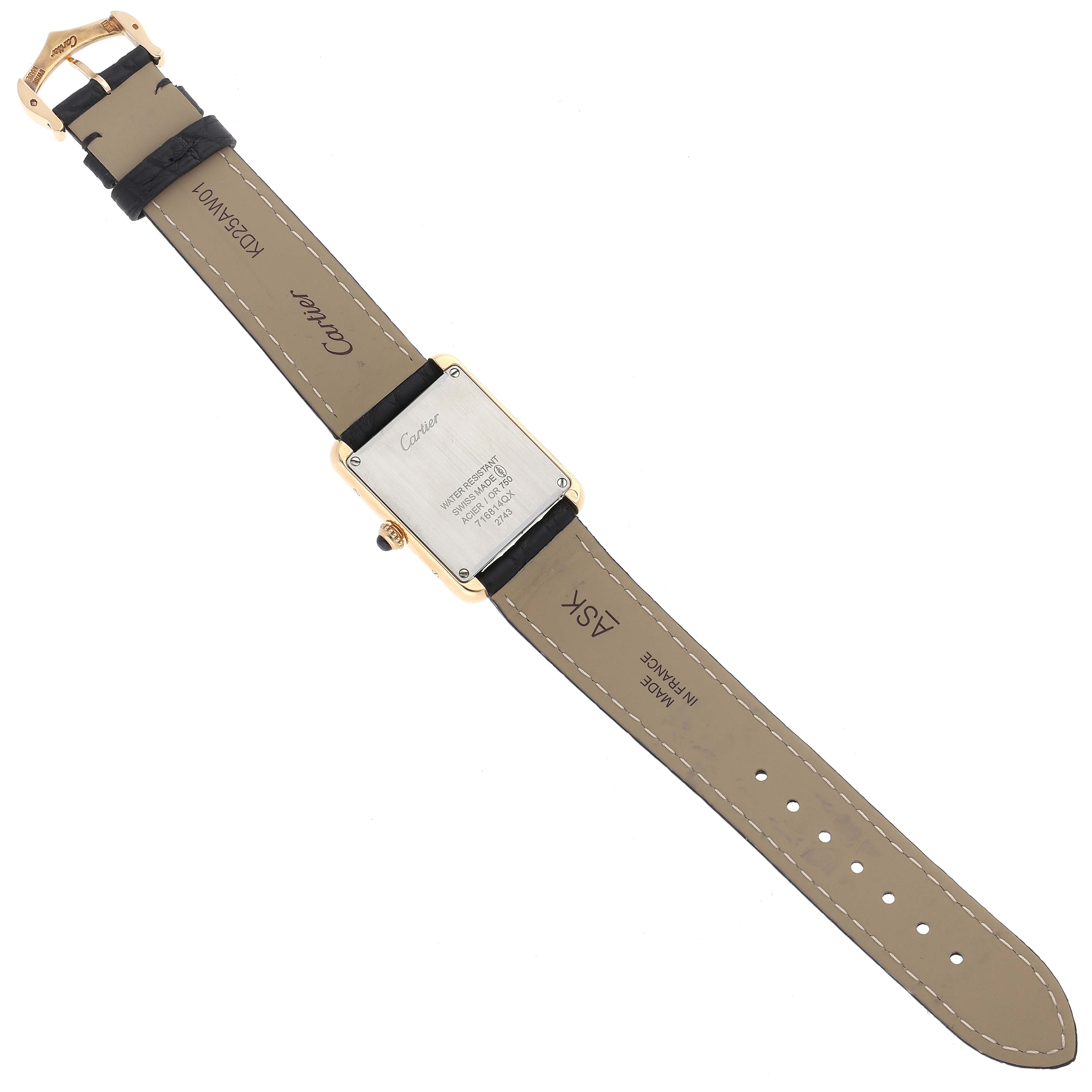 The image shows the back view of the Tank Solo watch by Cartier, highlighting the case back and leather strap.