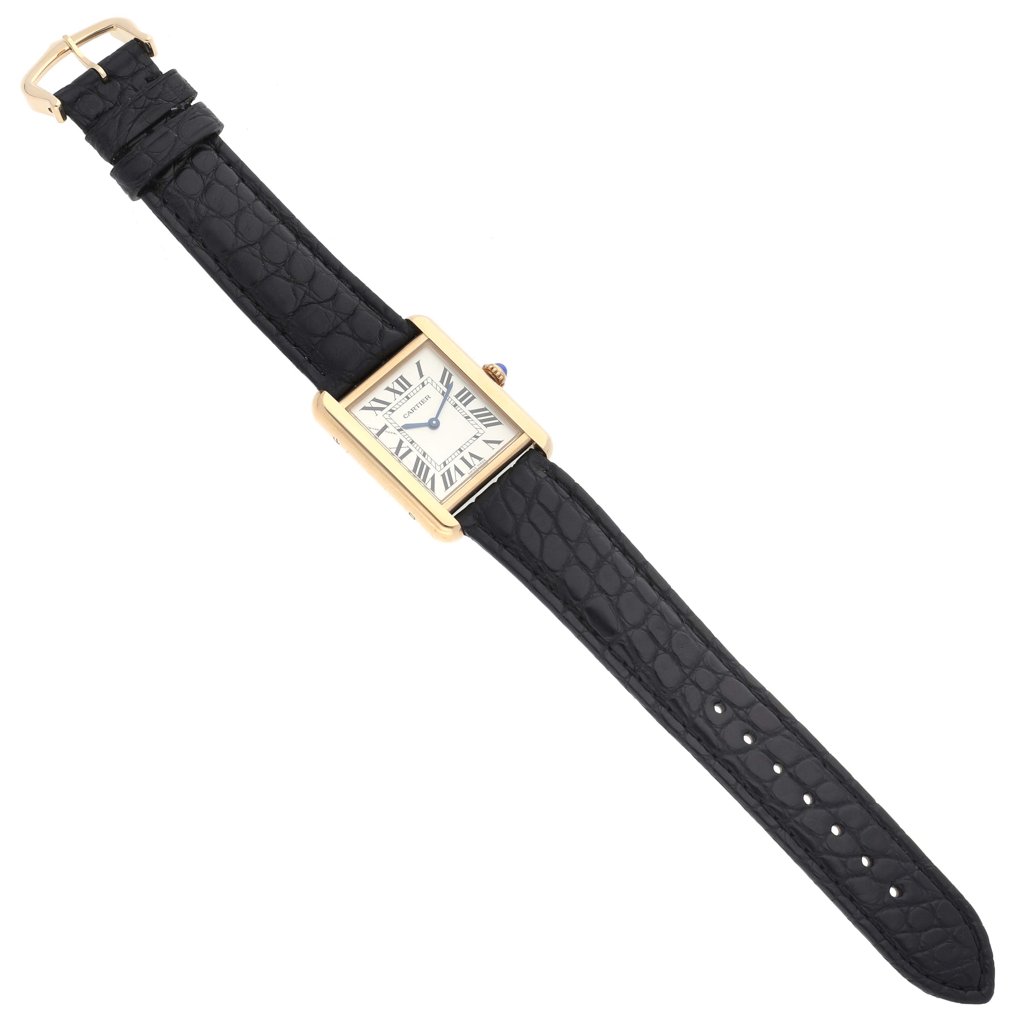 The Cartier Tank Solo W5200002 Women's Steel and Gold (two tone) Silver Dial W5200002 Women's Steel and Gold (two tone) Silver Dial watch is shown from a top-down angle, displaying the entire face, leather strap, and buckle.