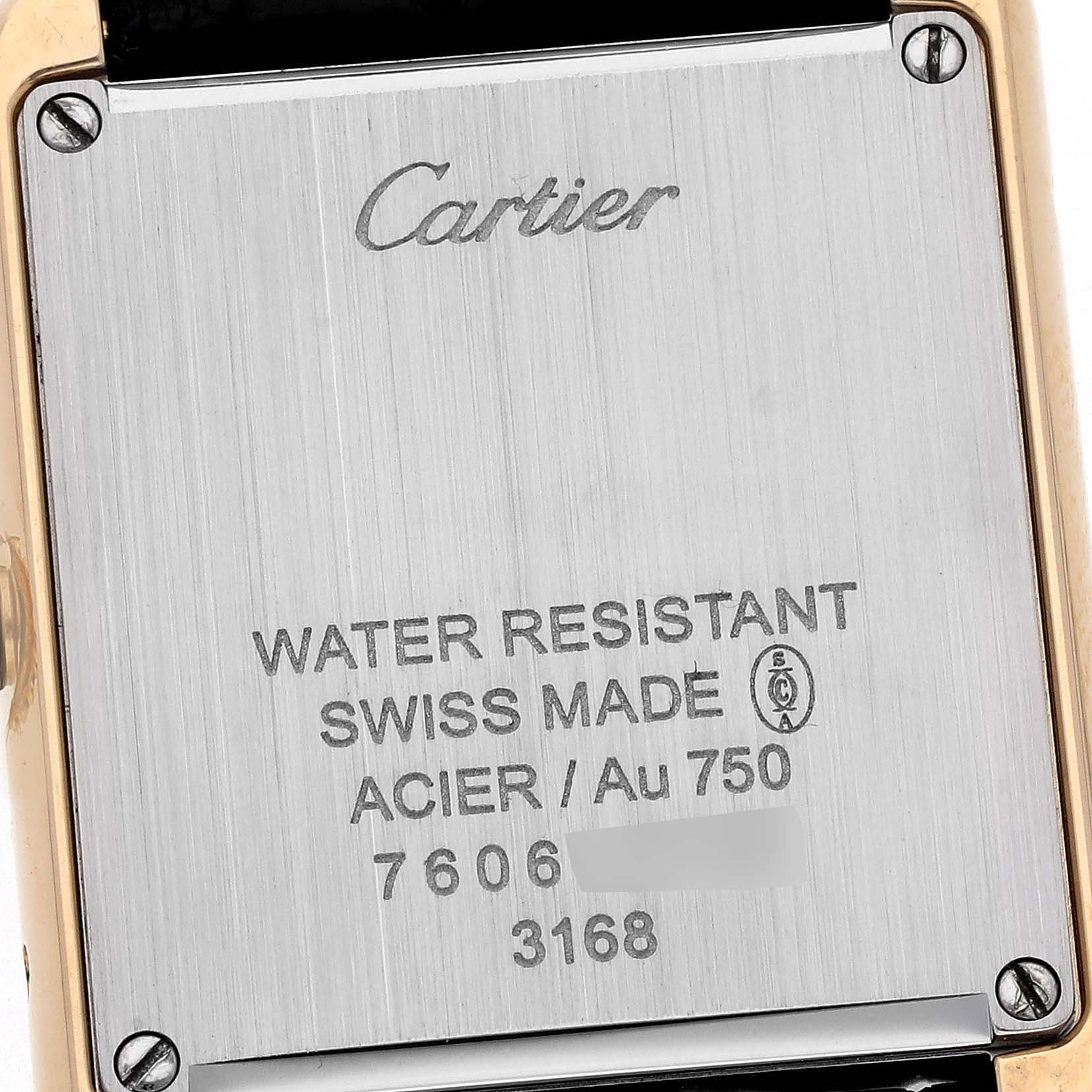 The image shows the back case of a Cartier Tank Solo W5200002 Women's Steel and Gold (two tone) Silver Dial W5200002 Women's Steel and Gold (two tone) Silver Dial watch, highlighting its engraved details.