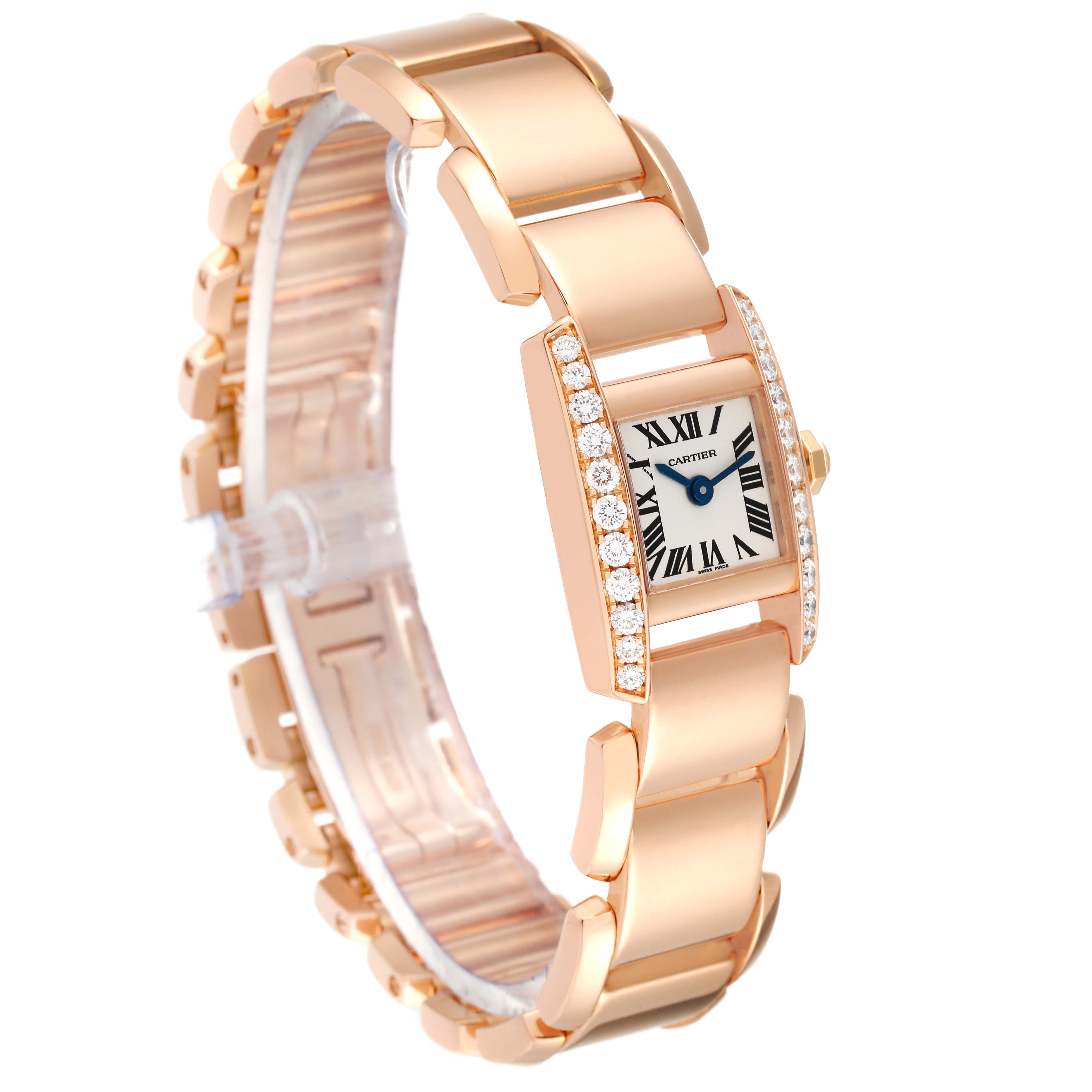 The Cartier Tankissime WE70058H Women
s Rose Gold Silver Dial WE70058H Women
s Rose Gold Silver Dial watch is shown at an angle highlighting its rectangular face and gold bracelet with diamond accents.