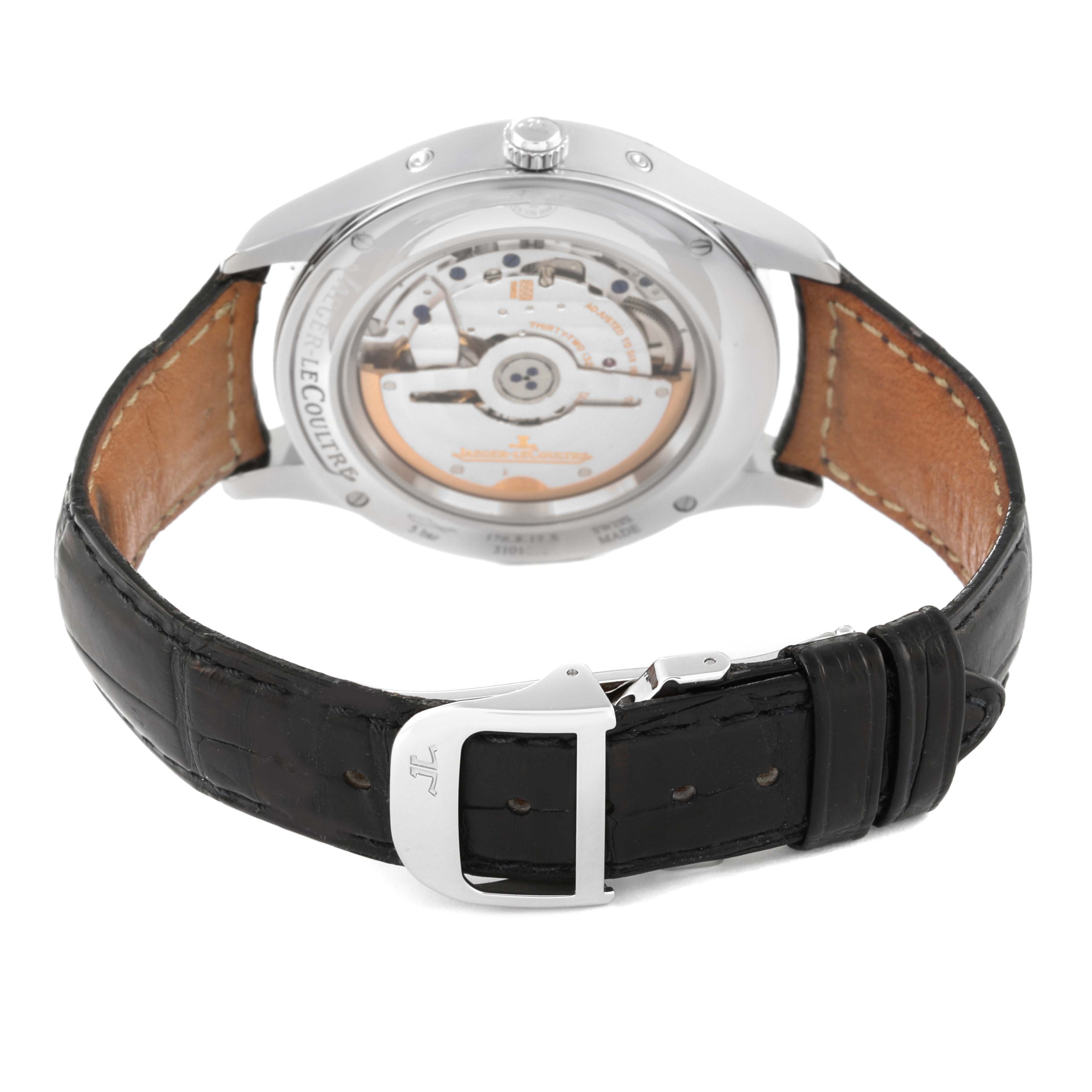 The image shows the back view of the Jaeger-LeCoultre Master model watch, highlighting its mechanical movement and leather strap.