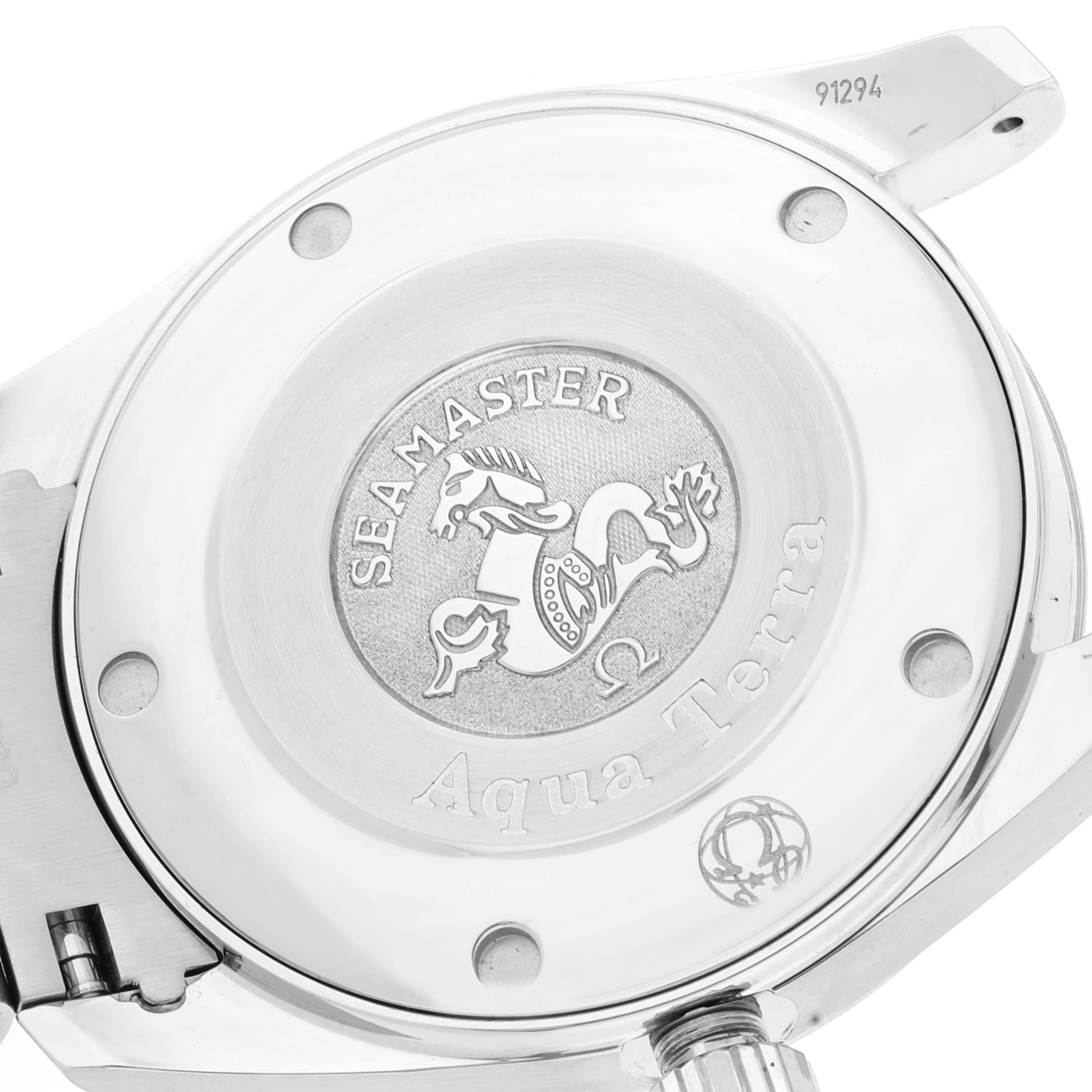 This image shows the back case of an Omega Aqua Terra 2517.80.00 Men's Stainless Steel Blue Dial 2517.80.00 Men's Stainless Steel Blue Dial Seamaster watch, highlighting the engraved logo and text.