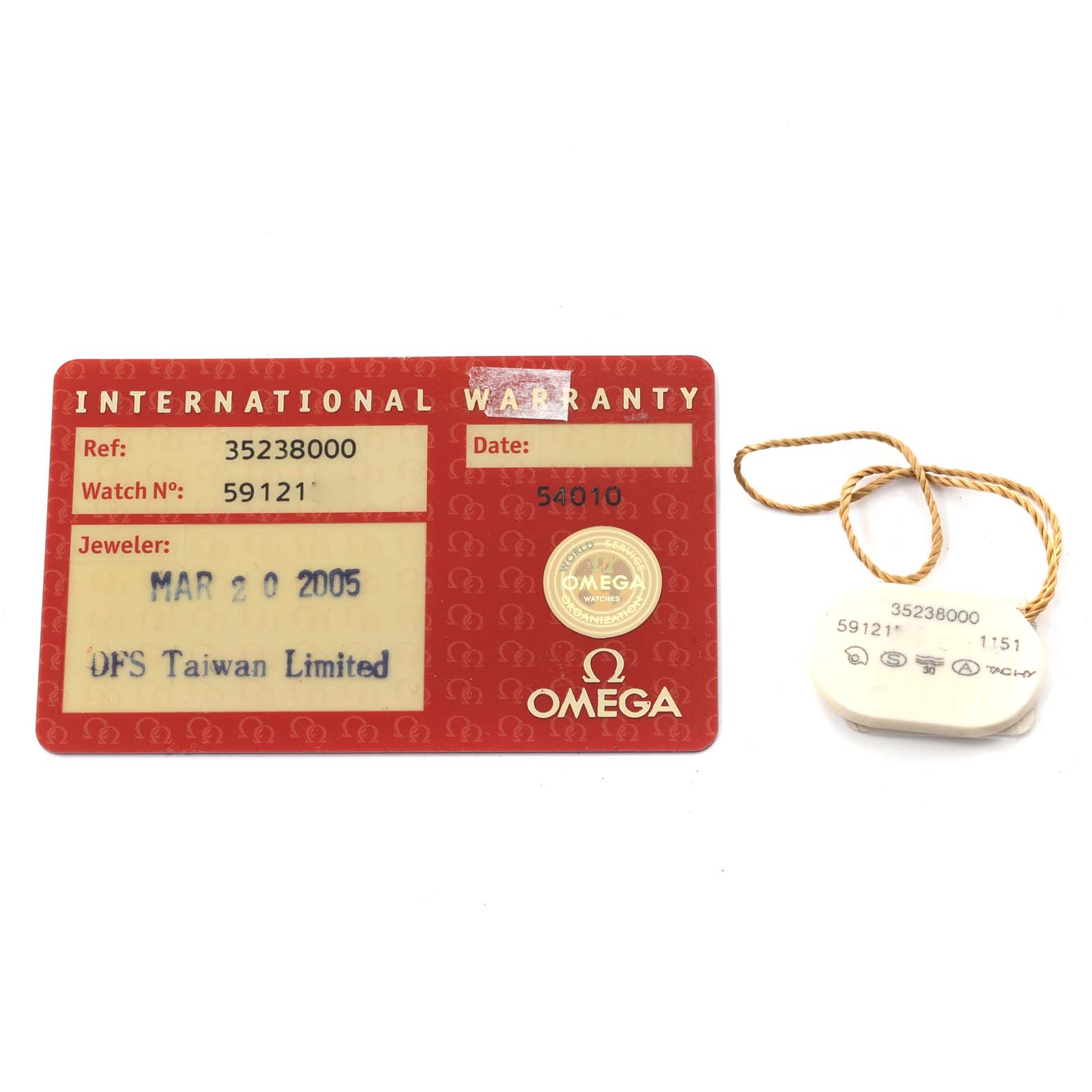 The image shows the warranty card and a tag for the Omega Speedmaster 3523.80.00 Men's Stainless Steel Blue Dial 3523.80.00 Men's Stainless Steel Blue Dial watch.