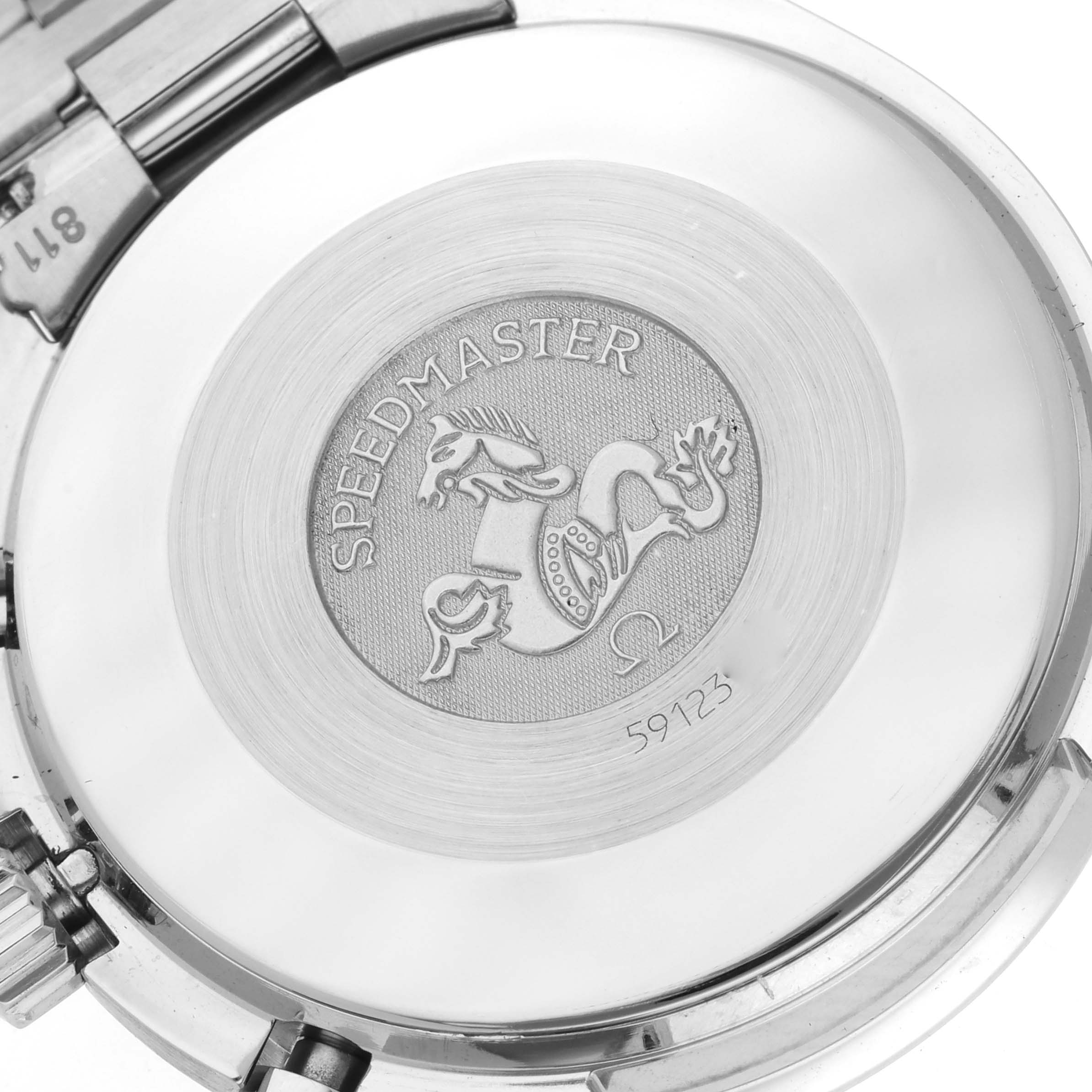 The image shows the back cover of an Omega Speedmaster 3510.50.00 Men
s Stainless Steel Black Dial 3510.50.00 Men
s Stainless Steel Black Dial watch, featuring its engraved emblem.