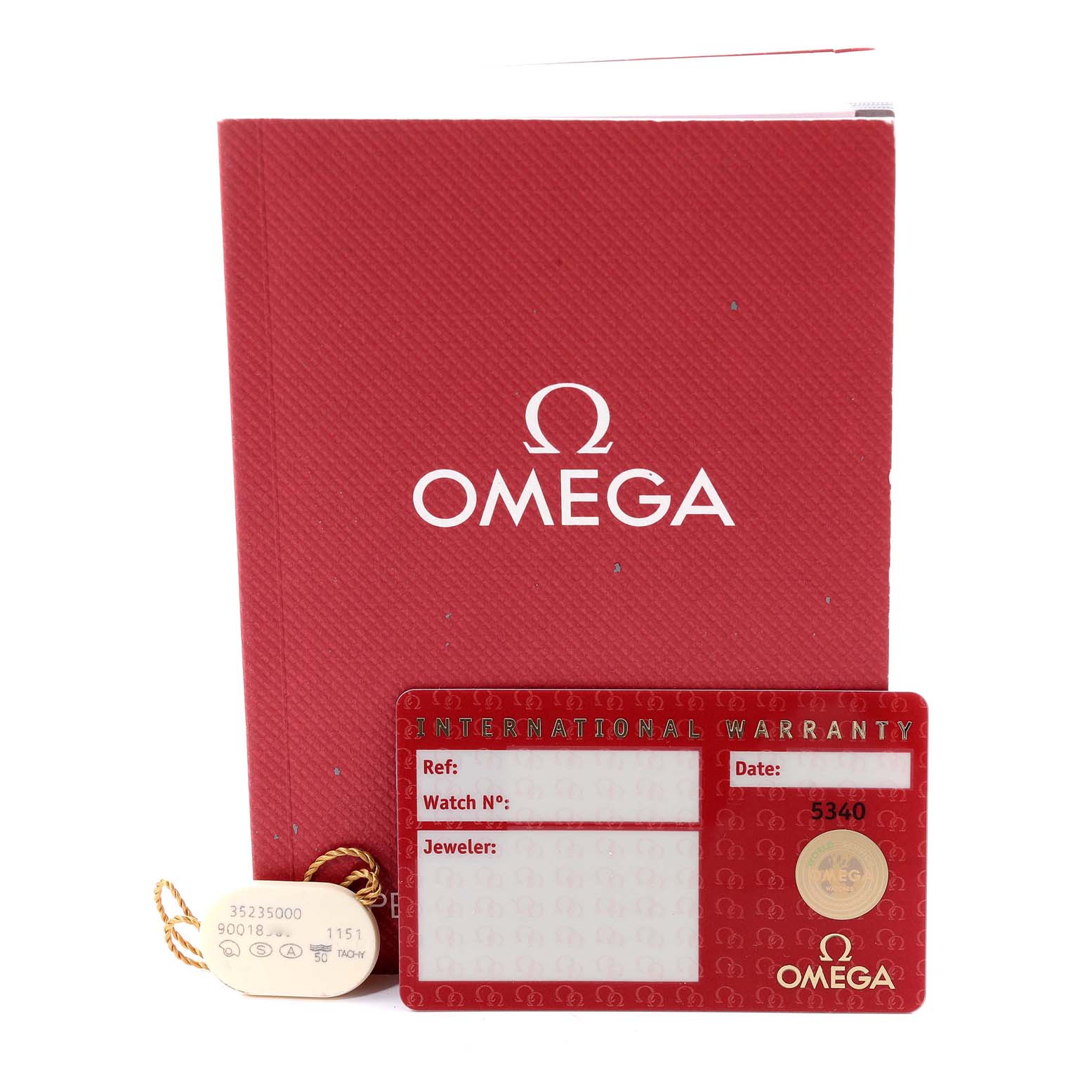 The image shows the warranty card, booklet, and hang tags for an Omega Speedmaster 3523.50.00 Men's Stainless Steel Black Dial 3523.50.00 Men's Stainless Steel Black Dial watch.