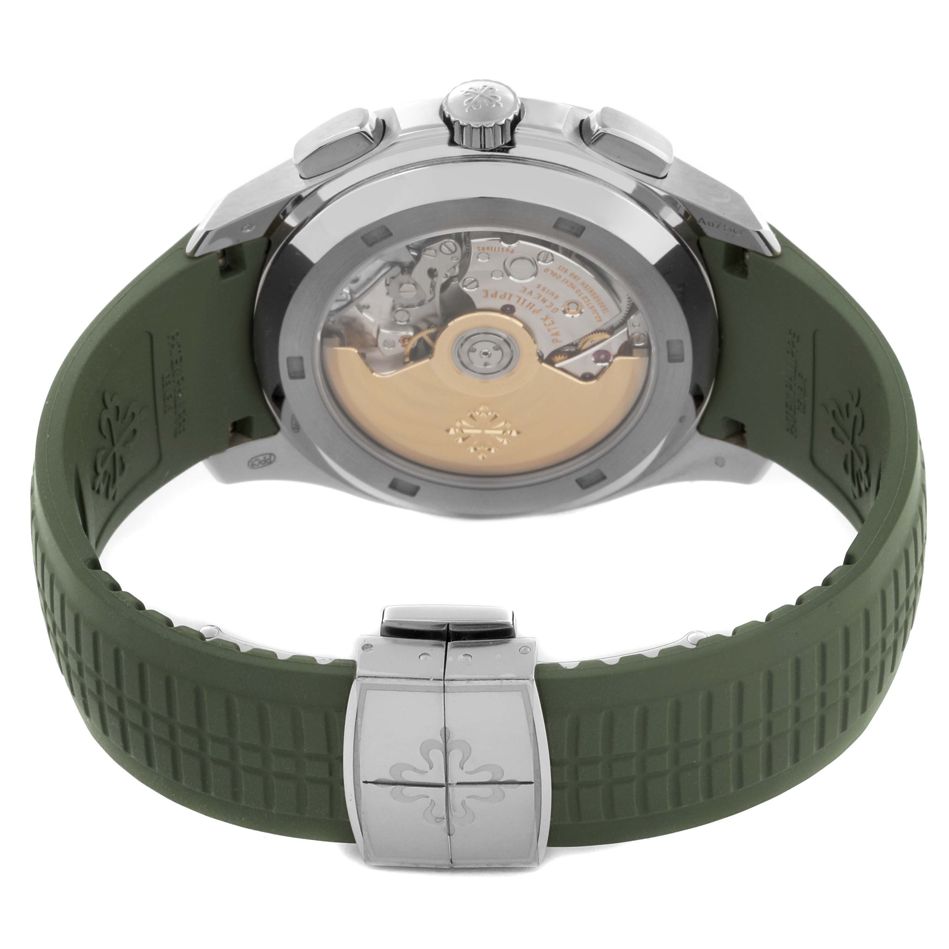 The Patek Philippe Aquanaut 5968G-010 Men's White Gold Green Dial 5968G-010 Men's White Gold Green Dial watch is shown from the back, highlighting its open case back, green strap, and clasp.