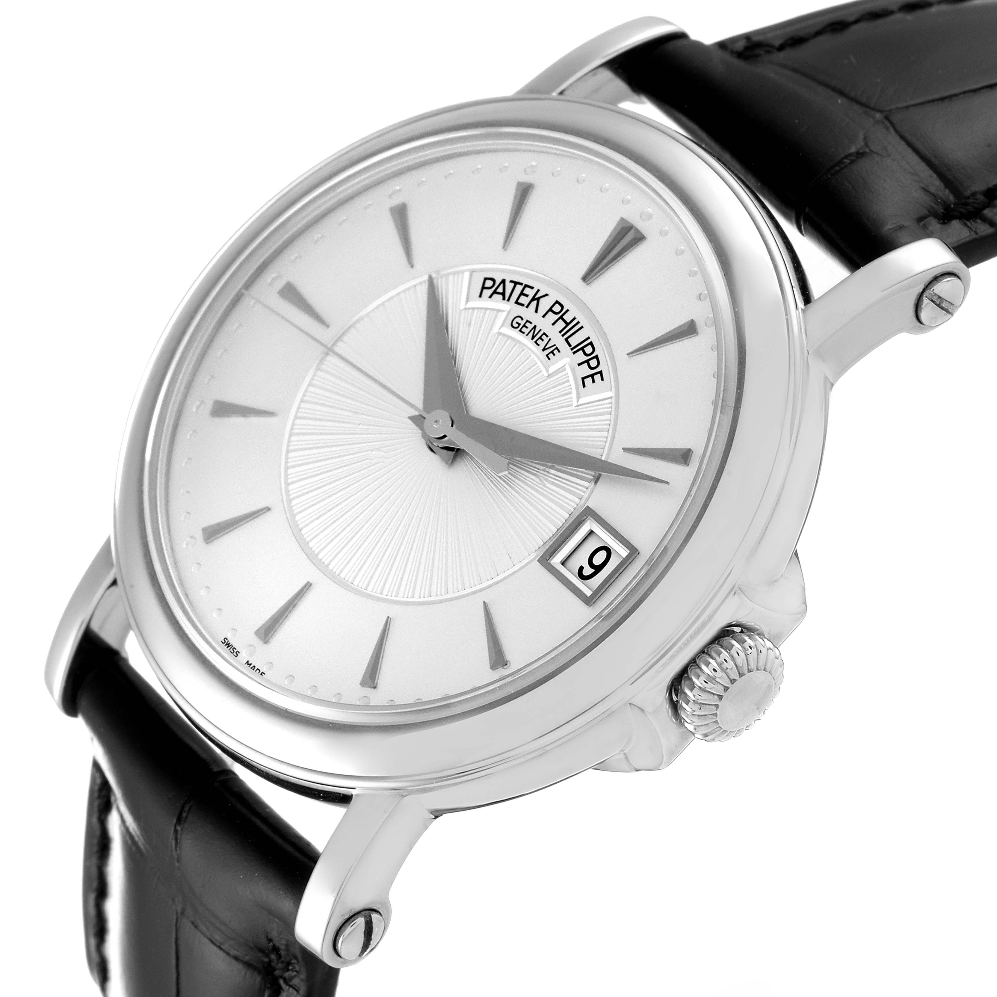 This image shows a Patek Philippe Calatrava 5153G Men
s White Gold Silver Dial 5153G Men
s White Gold Silver Dial watch at an angled side view, highlighting the dial, crown, and leather strap.