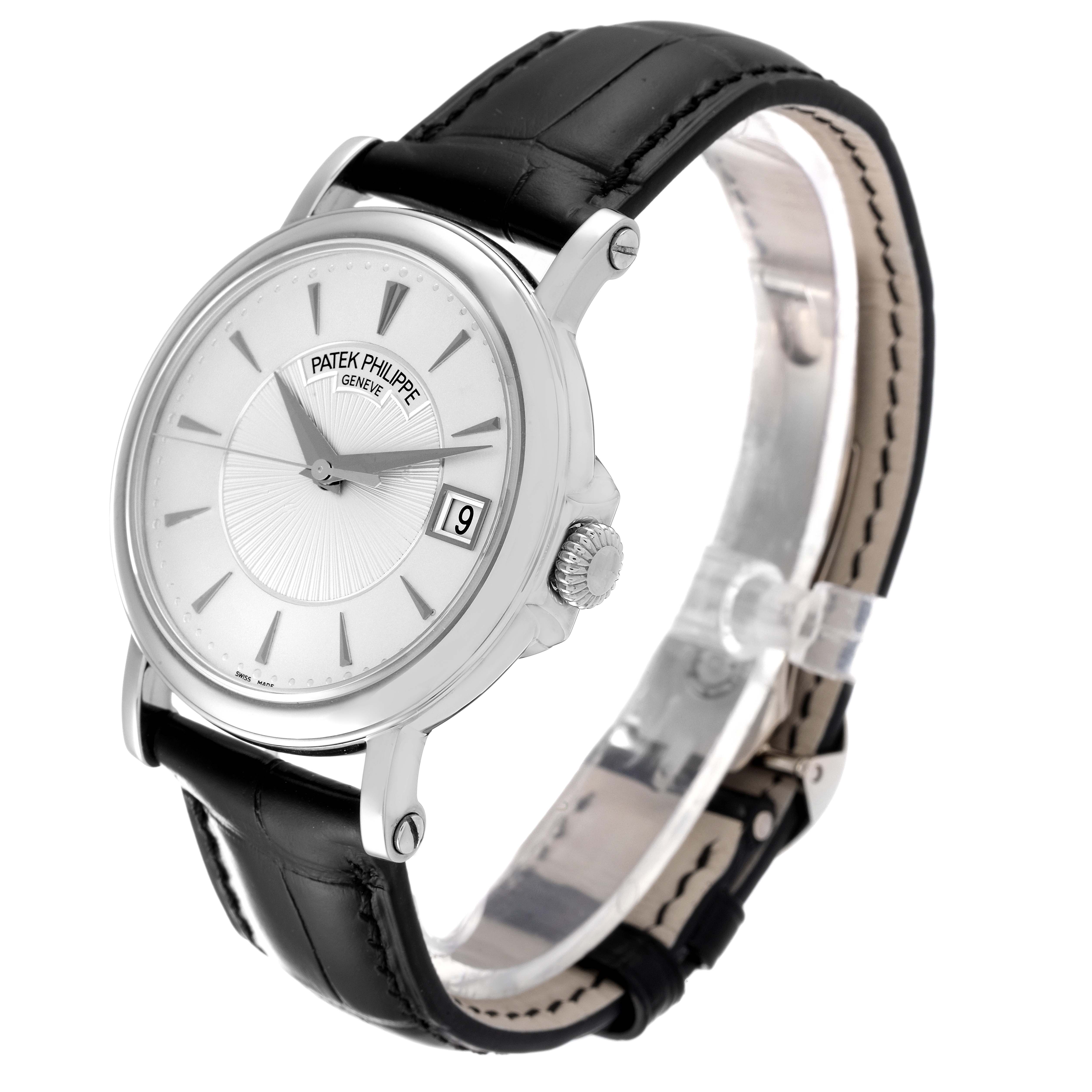 This image shows a Patek Philippe Calatrava 5153G Men
s White Gold Silver Dial 5153G Men
s White Gold Silver Dial watch from a front-side angle, highlighting the dial, crown, and leather strap.