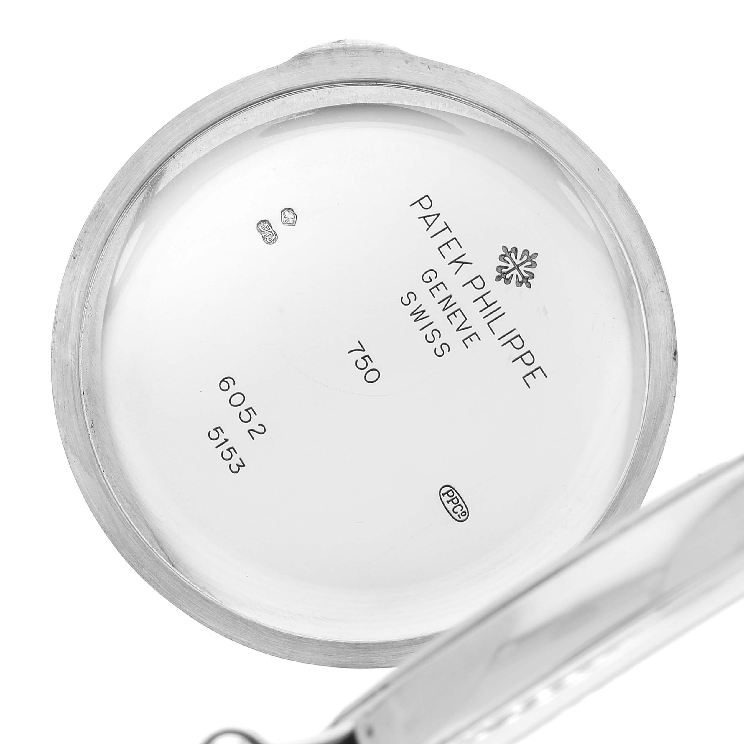 The image shows the inside case back of a Patek Philippe Calatrava 5153G Men
s White Gold Silver Dial 5153G Men
s White Gold Silver Dial watch, engraved with brand details and hallmarks.