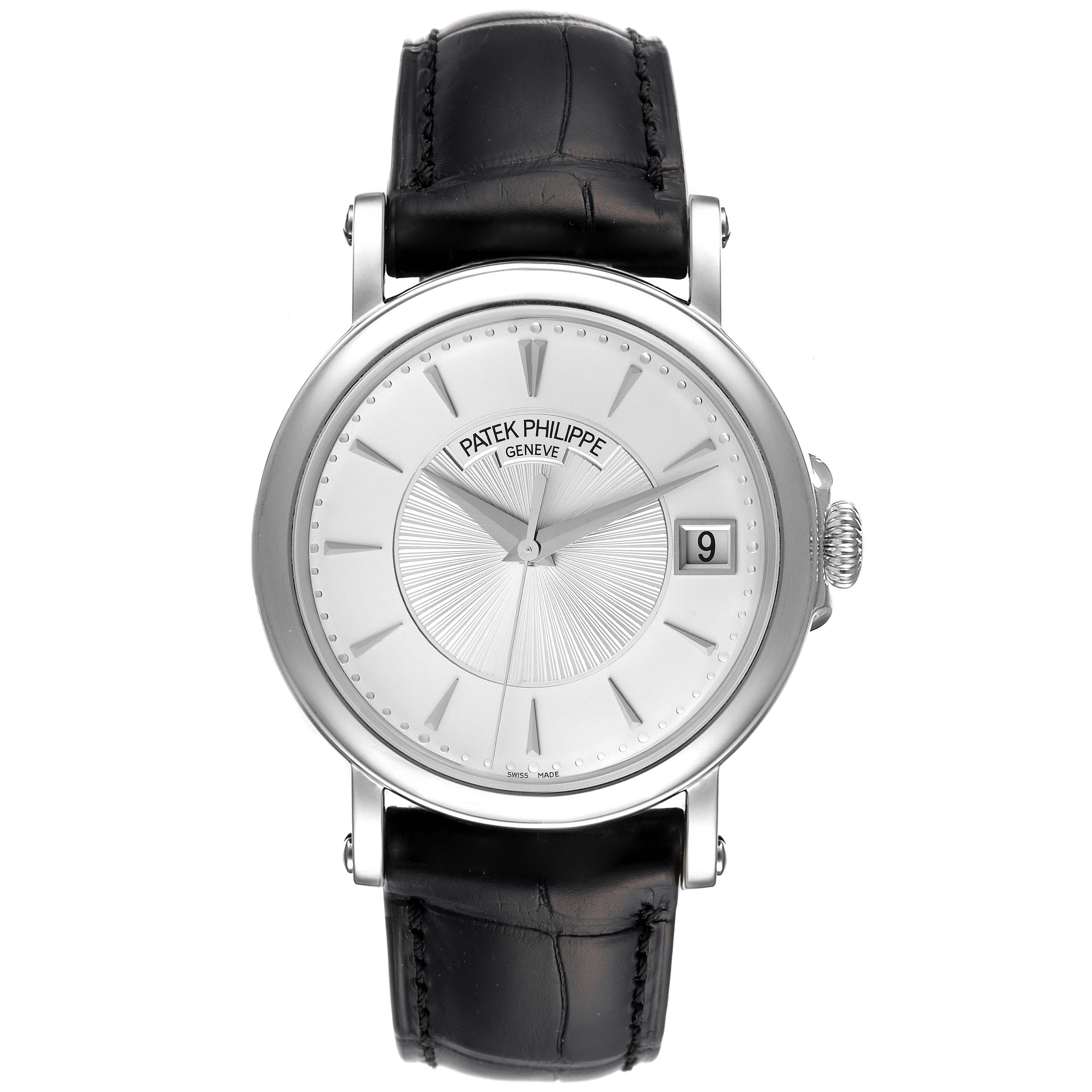 This image shows a head-on view of a Patek Philippe Calatrava 5153G Men
s White Gold Silver Dial 5153G Men
s White Gold Silver Dial watch, highlighting its dial, hands, date window, and leather strap.