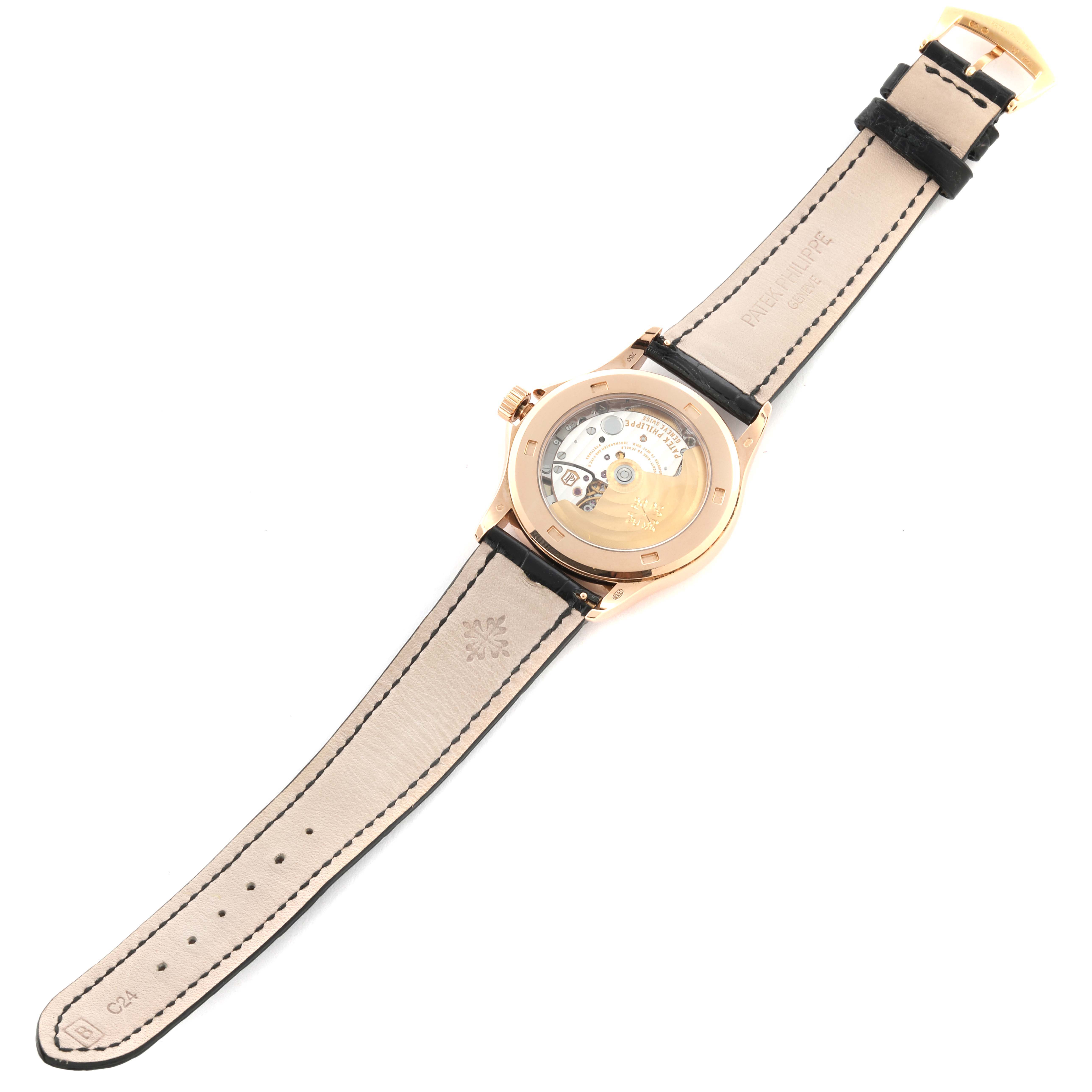 The Patek Philippe Calatrava 5127R-001 Men's Rose Gold Silver Dial 5127R-001 Men's Rose Gold Silver Dial watch is shown from the back, displaying its movement and leather strap.