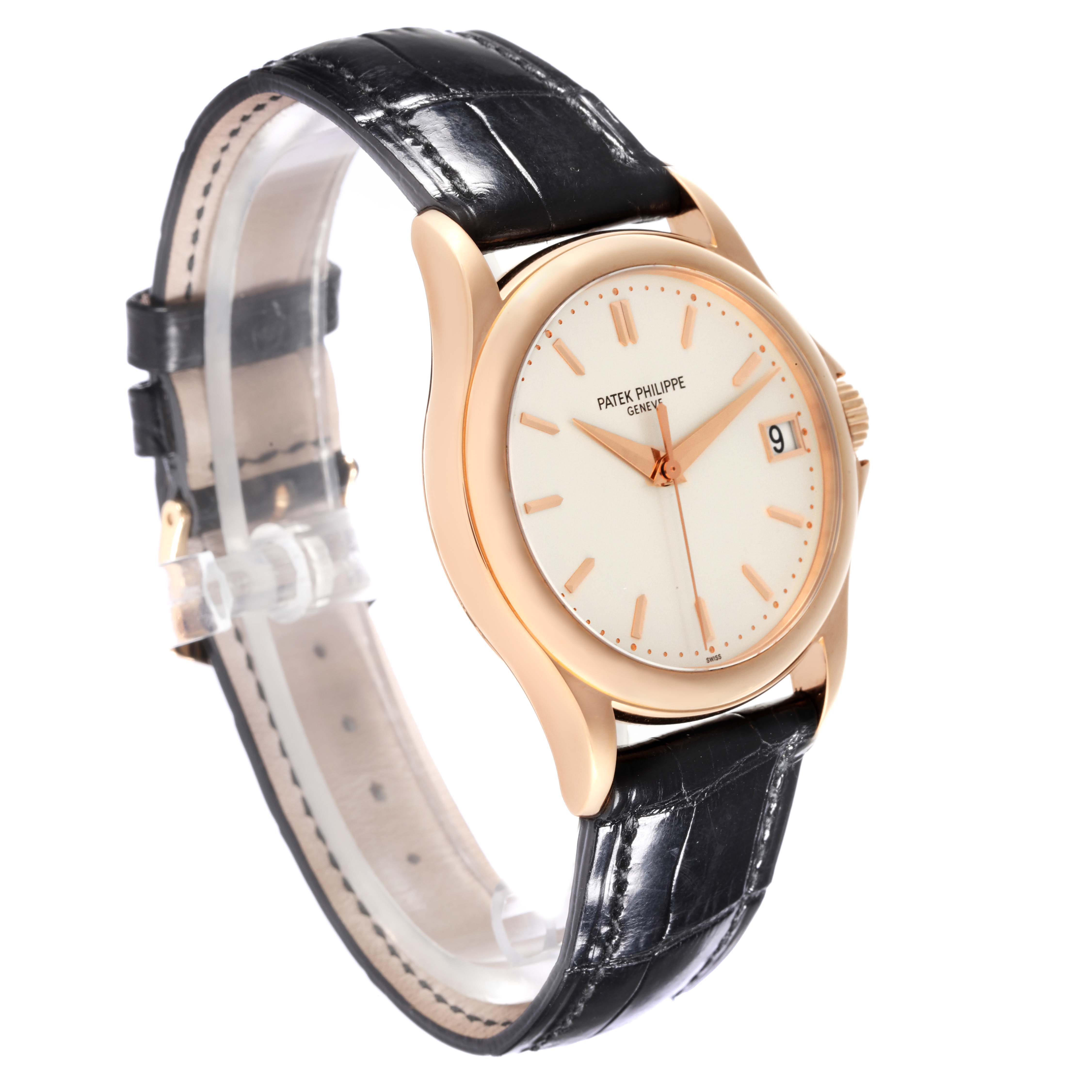 The Patek Philippe Calatrava 5127R-001 Men's Rose Gold Silver Dial 5127R-001 Men's Rose Gold Silver Dial watch is shown at a three-quarter angle, featuring its dial, bezel, and leather strap.