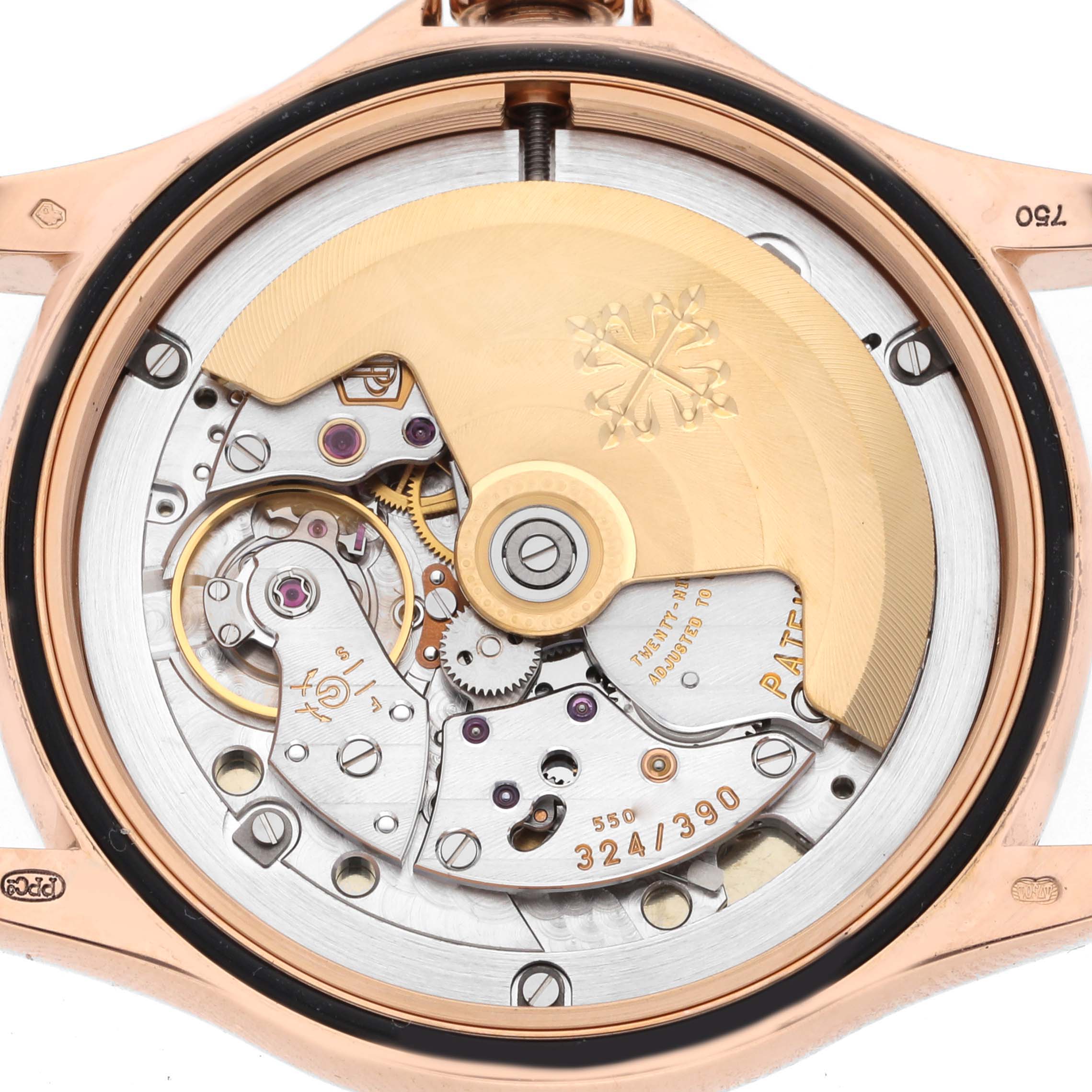 The image shows the back view of the Patek Philippe Calatrava 5127R-001 Men's Rose Gold Silver Dial 5127R-001 Men's Rose Gold Silver Dial, focusing on the intricate movement and rotor.