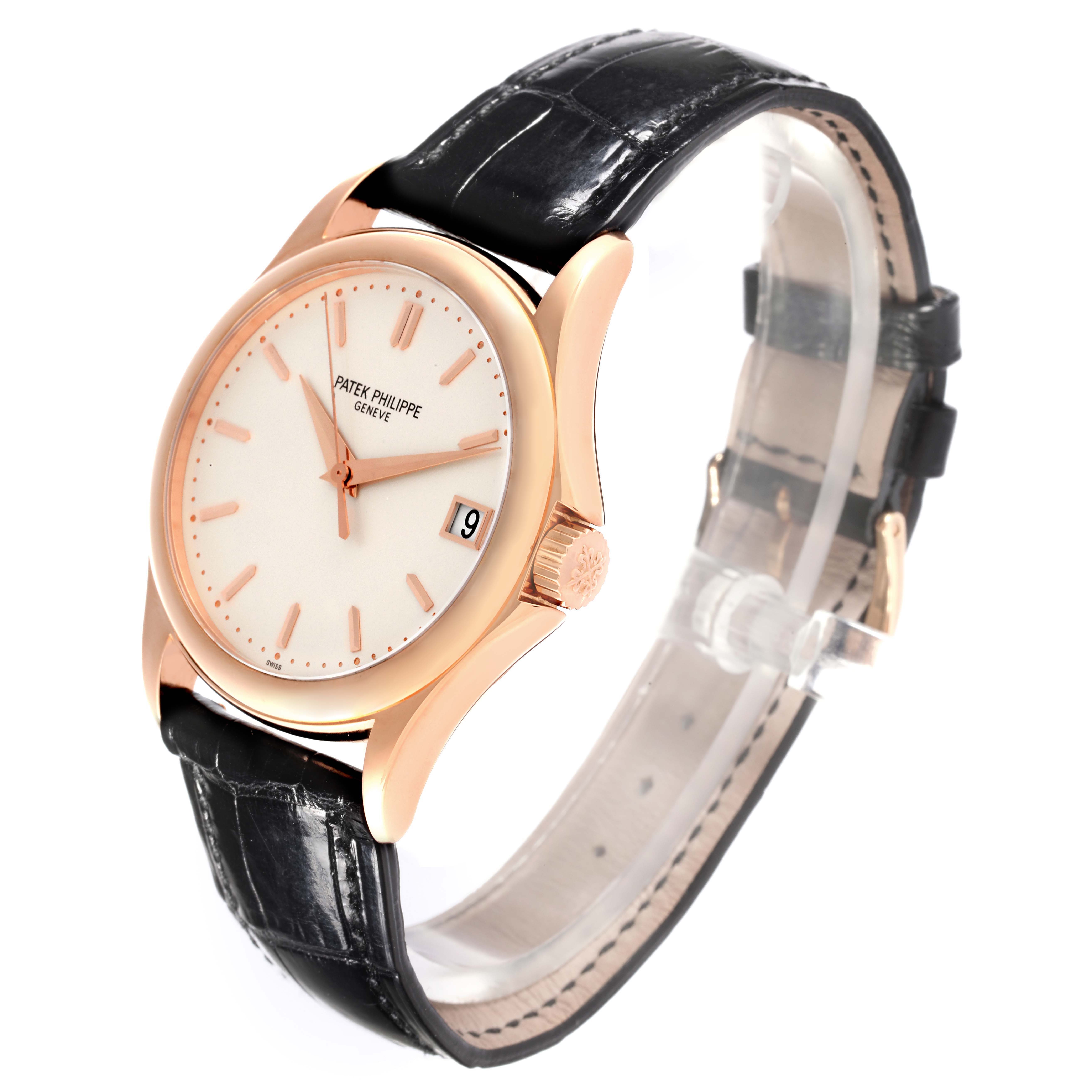 The Patek Philippe Calatrava 5127R-001 Men's Rose Gold Silver Dial 5127R-001 Men's Rose Gold Silver Dial watch is shown at a three-quarter angle displaying the face, side, and leather strap.