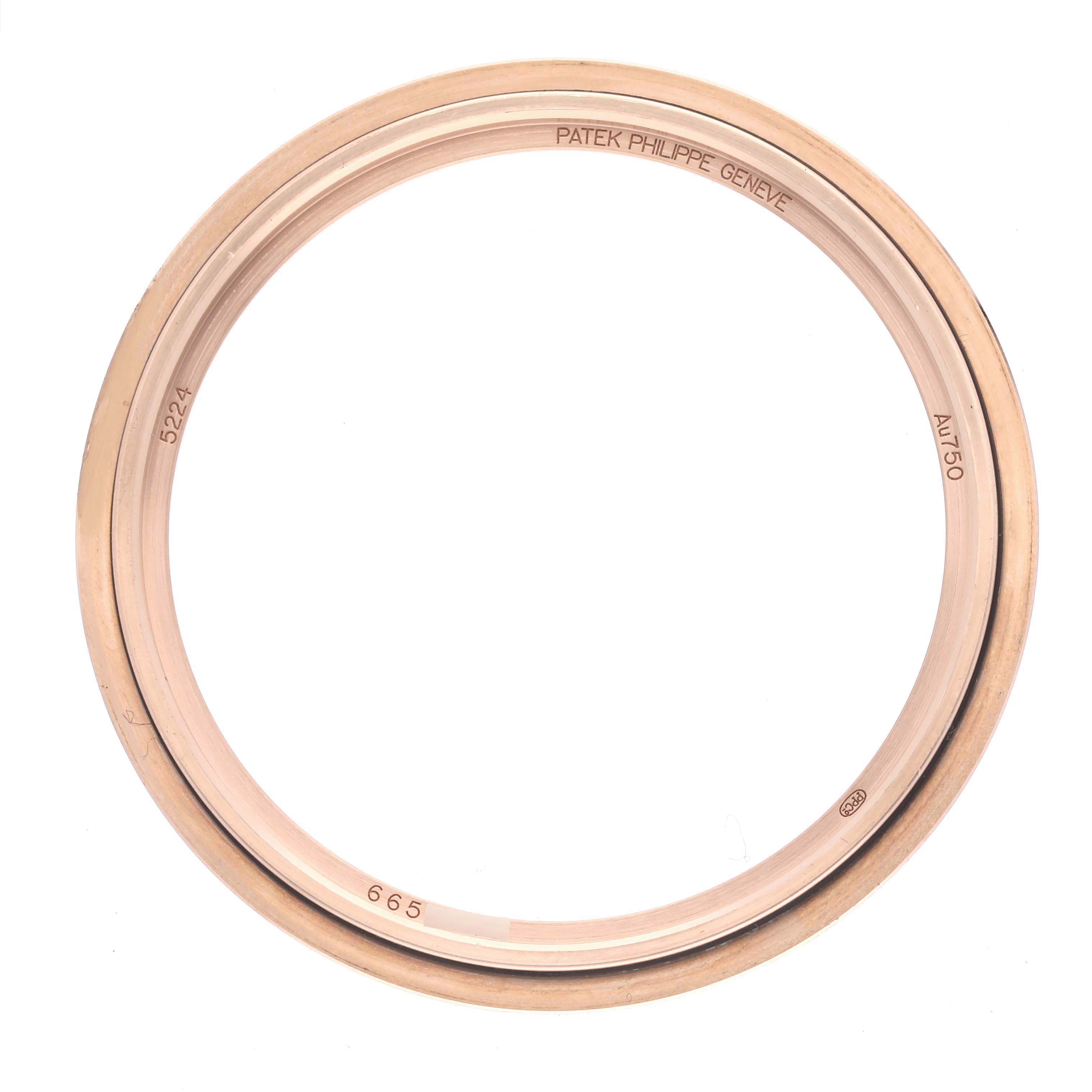 The image shows a top view of a Patek Philippe Calatrava 5224R-001 Men
s Rose Gold Blue Dial 5224R-001 Men
s Rose Gold Blue Dial bezel without the watch face.