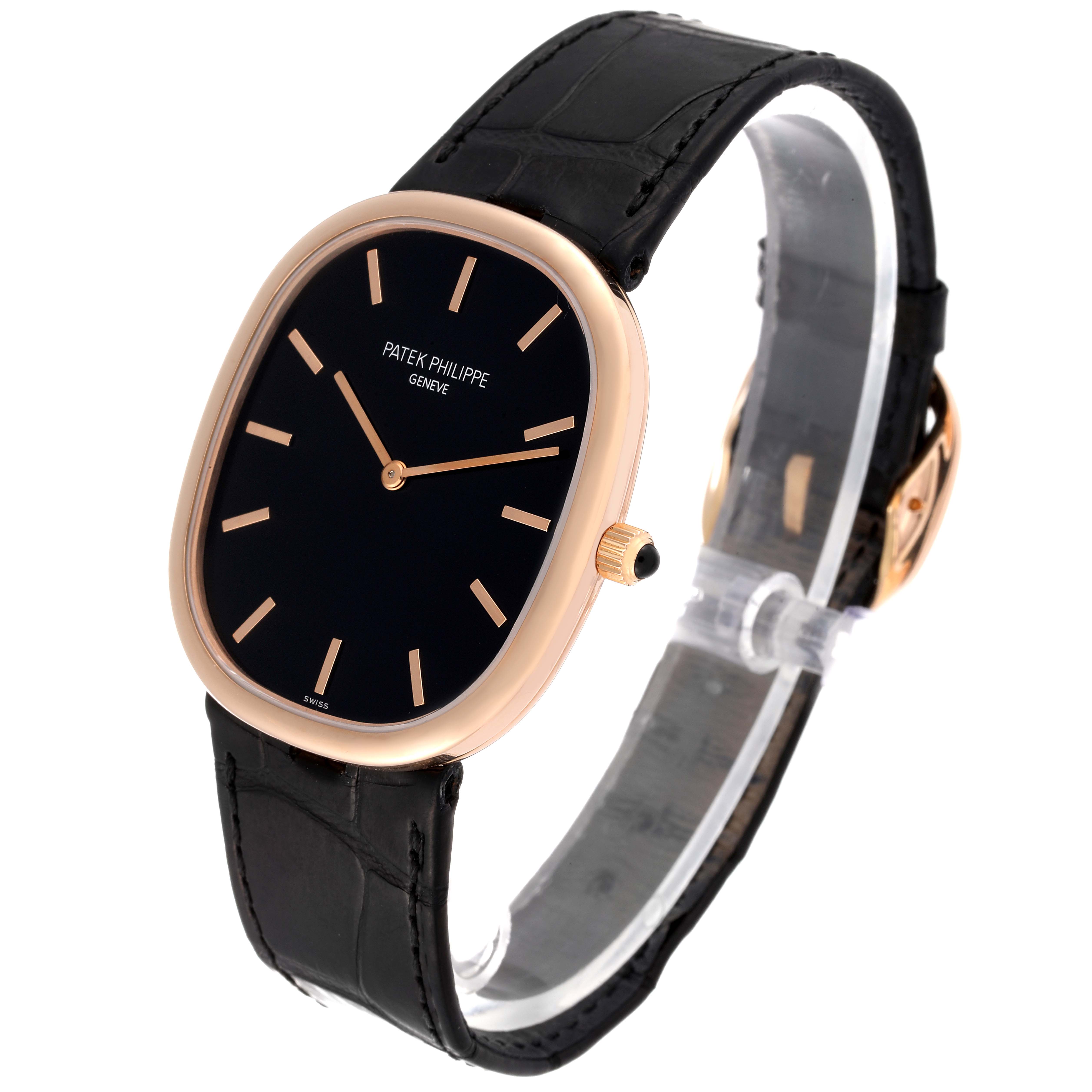 The image shows a Patek Philippe Golden Ellipse 5738R-001 Men's Rose Gold Black Dial 5738R-001 Men's Rose Gold Black Dial watch angled to display the face, bezel, and part of the black strap.