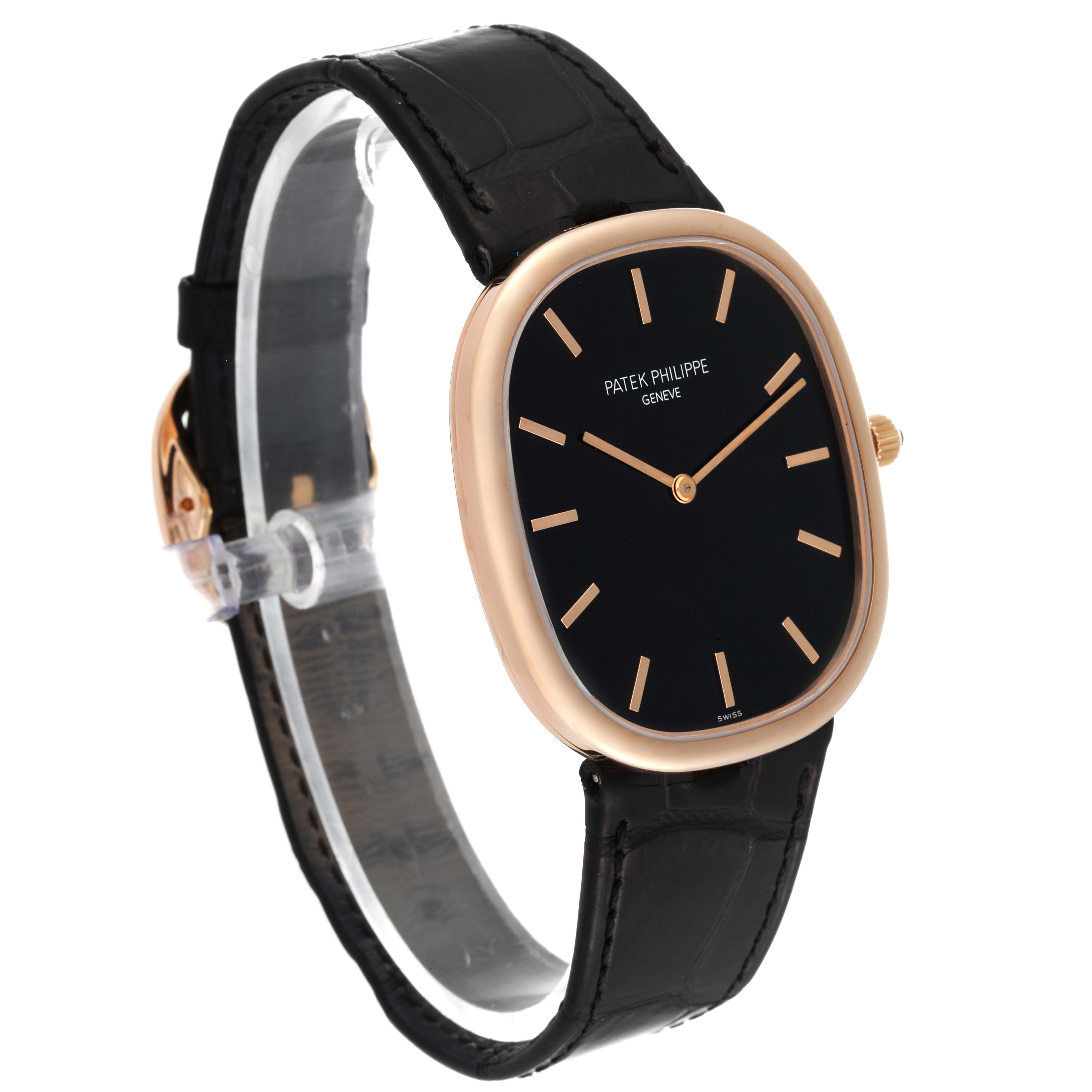 This is a side-angle view of the Patek Philippe Golden Ellipse 5738R-001 Men's Rose Gold Black Dial 5738R-001 Men's Rose Gold Black Dial watch, showing the black strap and dial with gold accents.