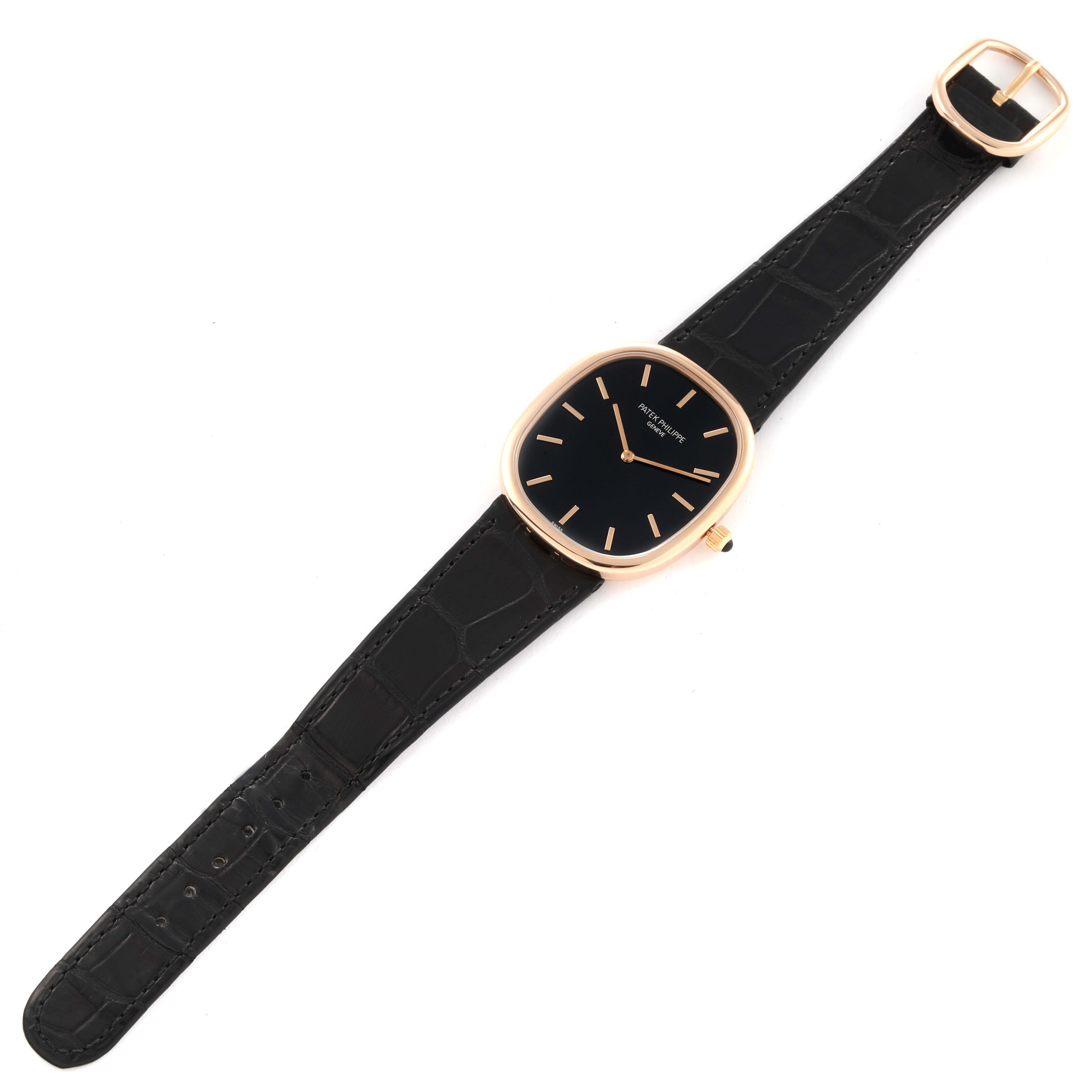 This image shows a top view of the entire Patek Philippe Golden Ellipse 5738R-001 Men's Rose Gold Black Dial 5738R-001 Men's Rose Gold Black Dial watch, including its face, strap, and buckle.