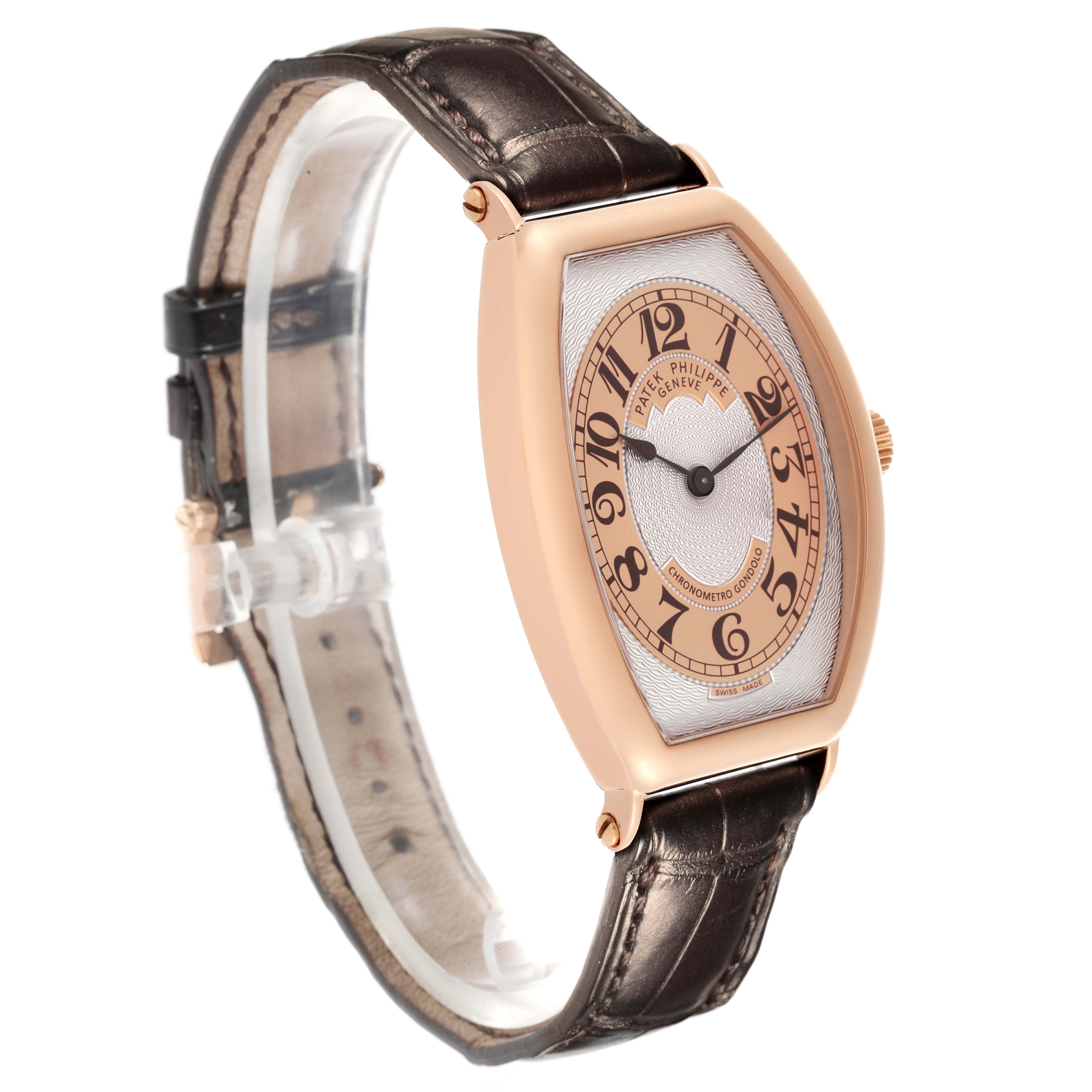 The Patek Philippe Gondolo 5098R-001 Men's Rose Gold Silver Dial 5098R-001 Men's Rose Gold Silver Dial watch is shown at a three-quarter angle, highlighting the face, crown, and leather strap.
