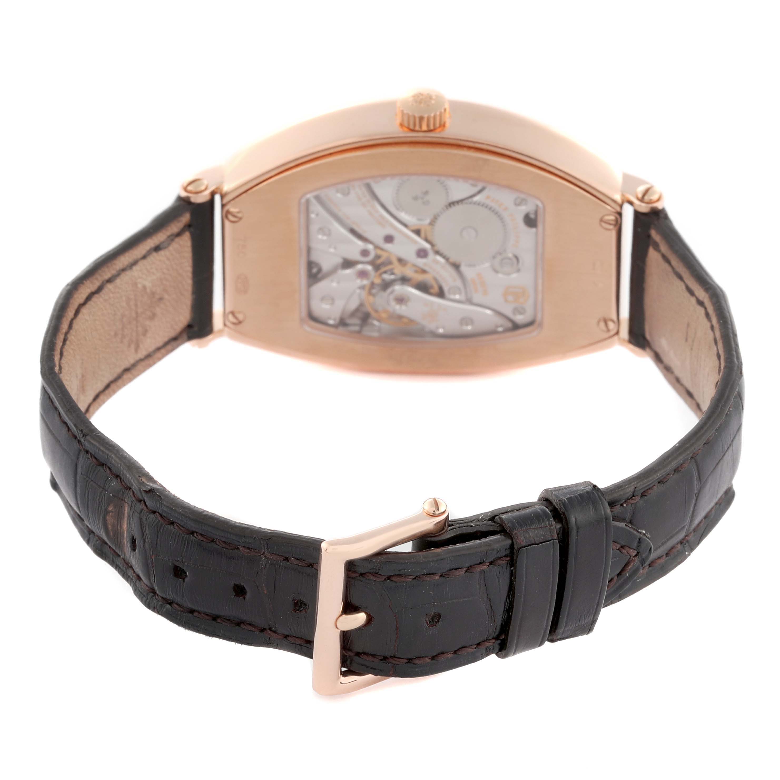 The Patek Philippe Gondolo 5098R-001 Men's Rose Gold Silver Dial 5098R-001 Men's Rose Gold Silver Dial watch is shown from the back, displaying the movement and part of the leather strap and buckle.