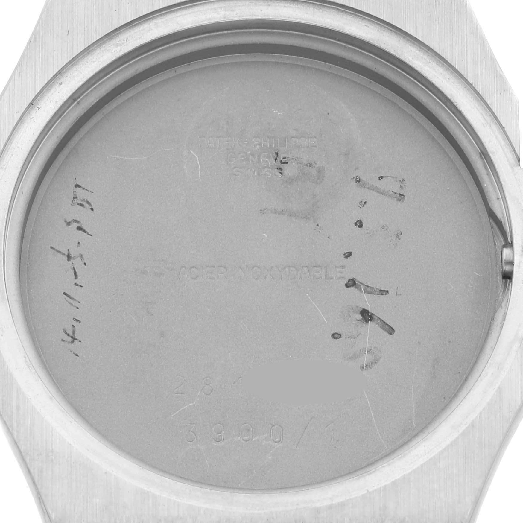 The image shows the inner side of the case back of a Patek Philippe Nautilus 3900/1J-001 Women's Stainless Steel Grey Dial 3900/1J-001 Women's Stainless Steel Grey Dial watch.