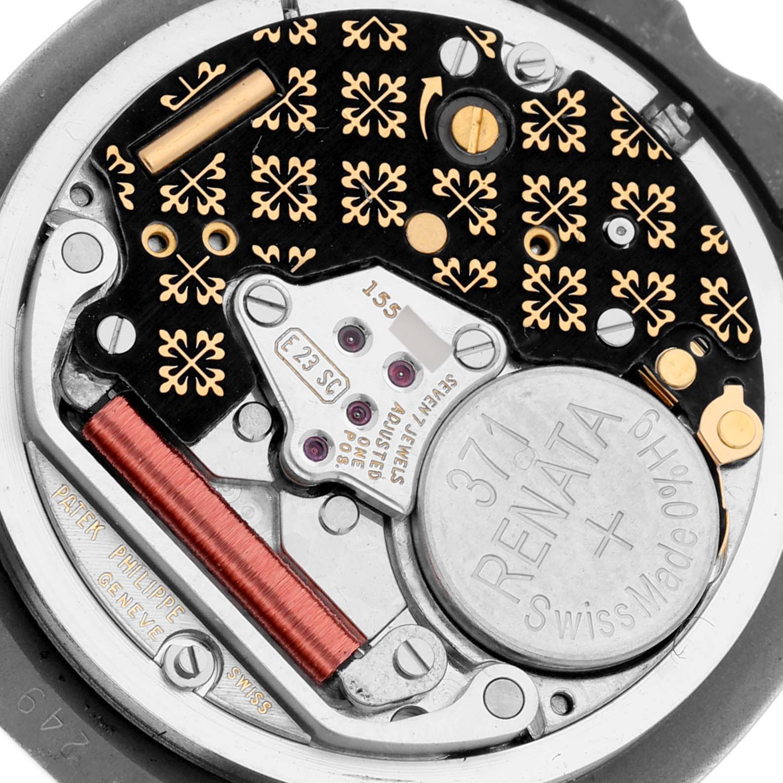 The image shows a close-up of the movement and battery inside a Patek Philippe Nautilus 3900/1J-001 Women's Stainless Steel Grey Dial 3900/1J-001 Women's Stainless Steel Grey Dial watch.