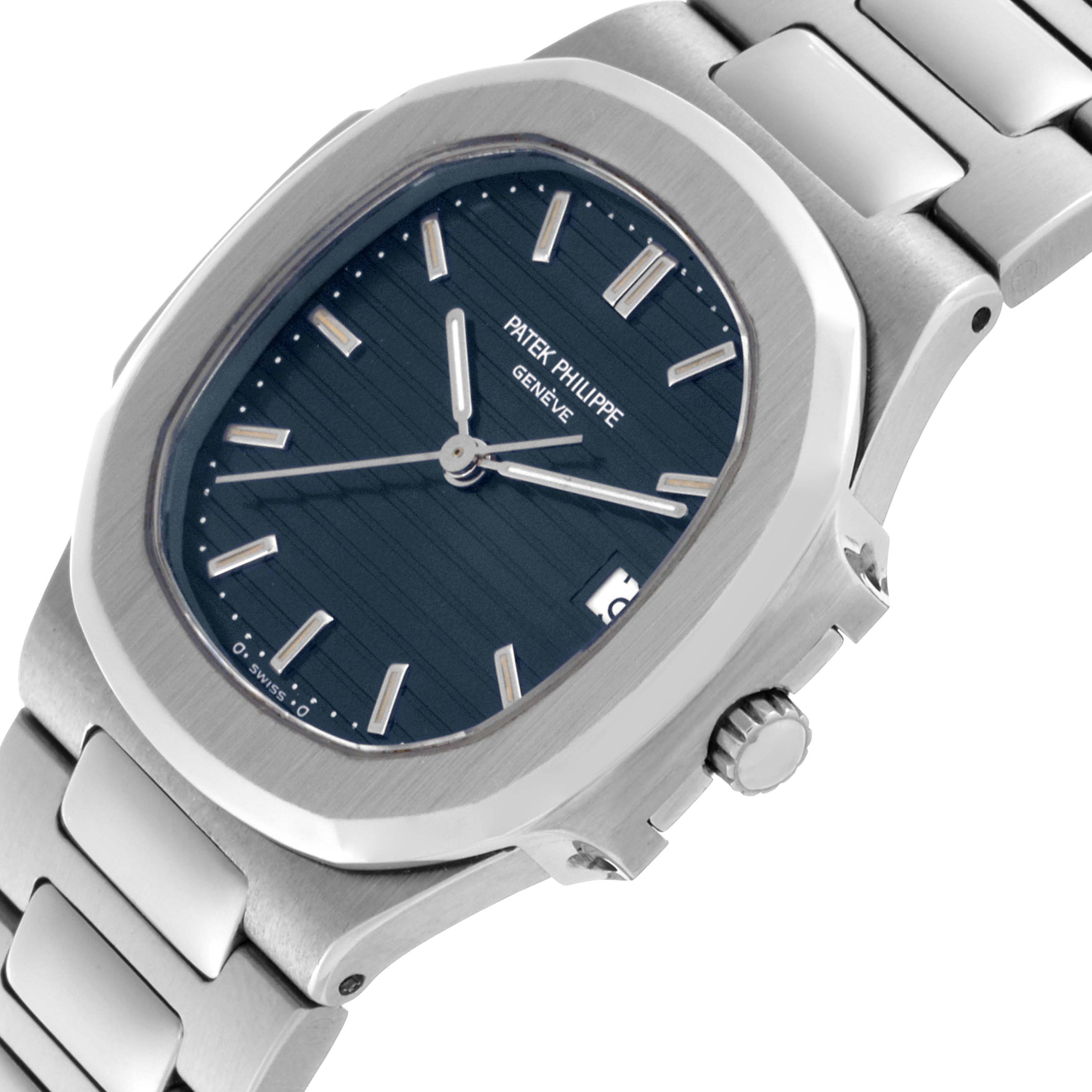 The Patek Philippe Nautilus 3900/1J-001 Women's Stainless Steel Grey Dial 3900/1J-001 Women's Stainless Steel Grey Dial watch is shown at a slight angle, displaying the face, crown, and part of the stainless steel bracelet.