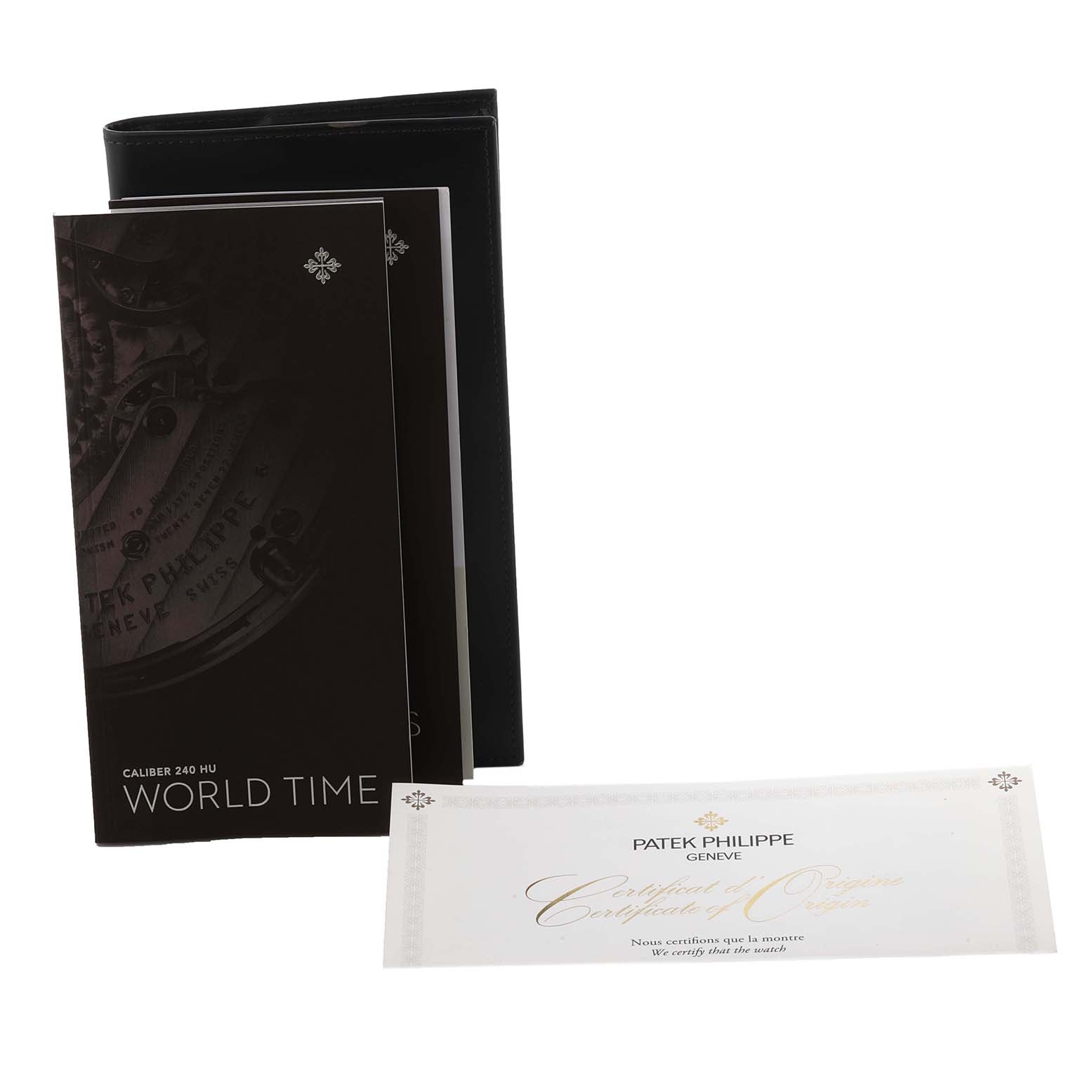 The image shows the certificate and booklet for the Patek Philippe Complications 5230G-001 Men's White Gold Grey Dial 5230G-001 Men's White Gold Grey Dial model.