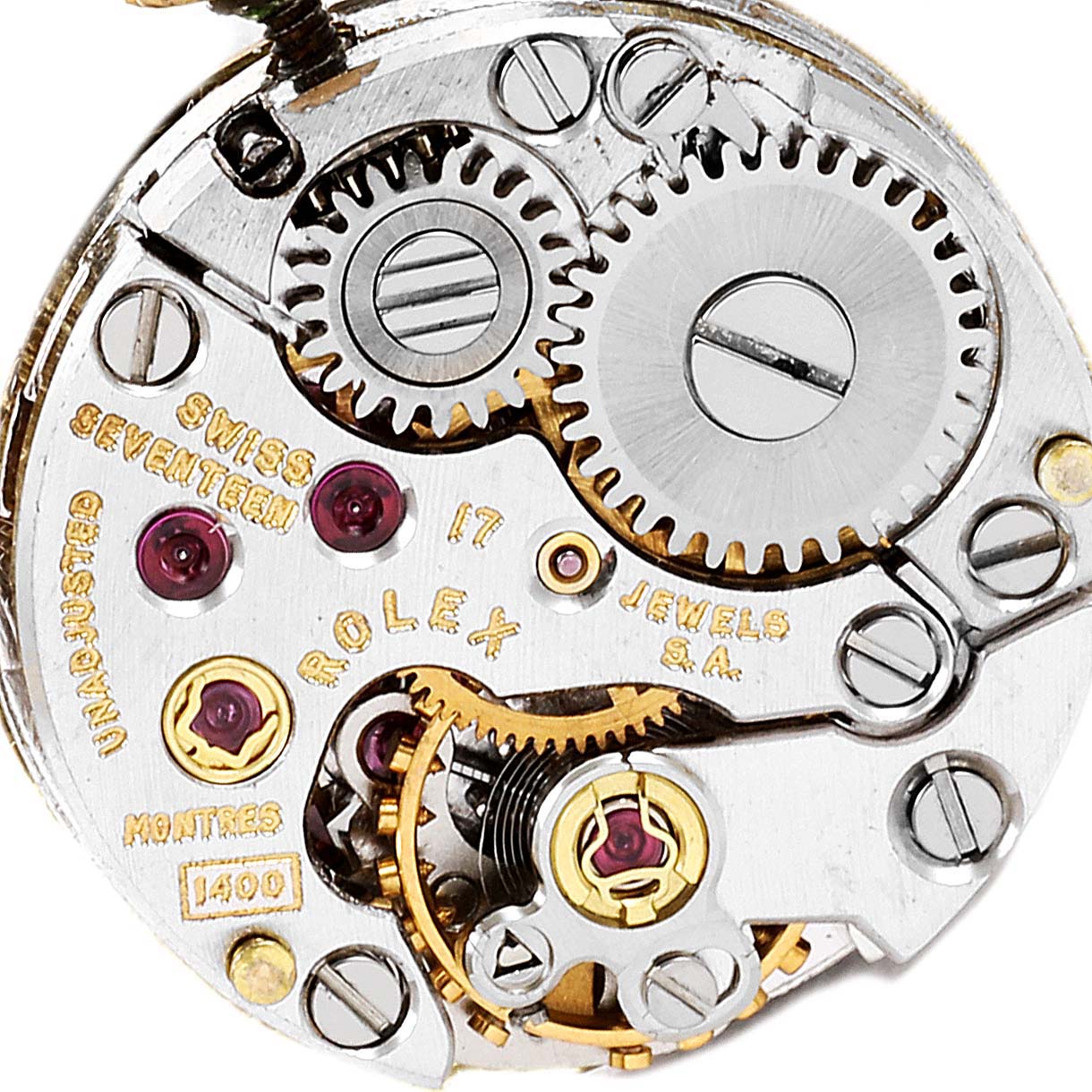 The image shows an angled close-up of the movement mechanism in a Rolex Cocktail Women
s Yellow Gold Champagne Dial Women
s Yellow Gold Champagne Dial model watch.