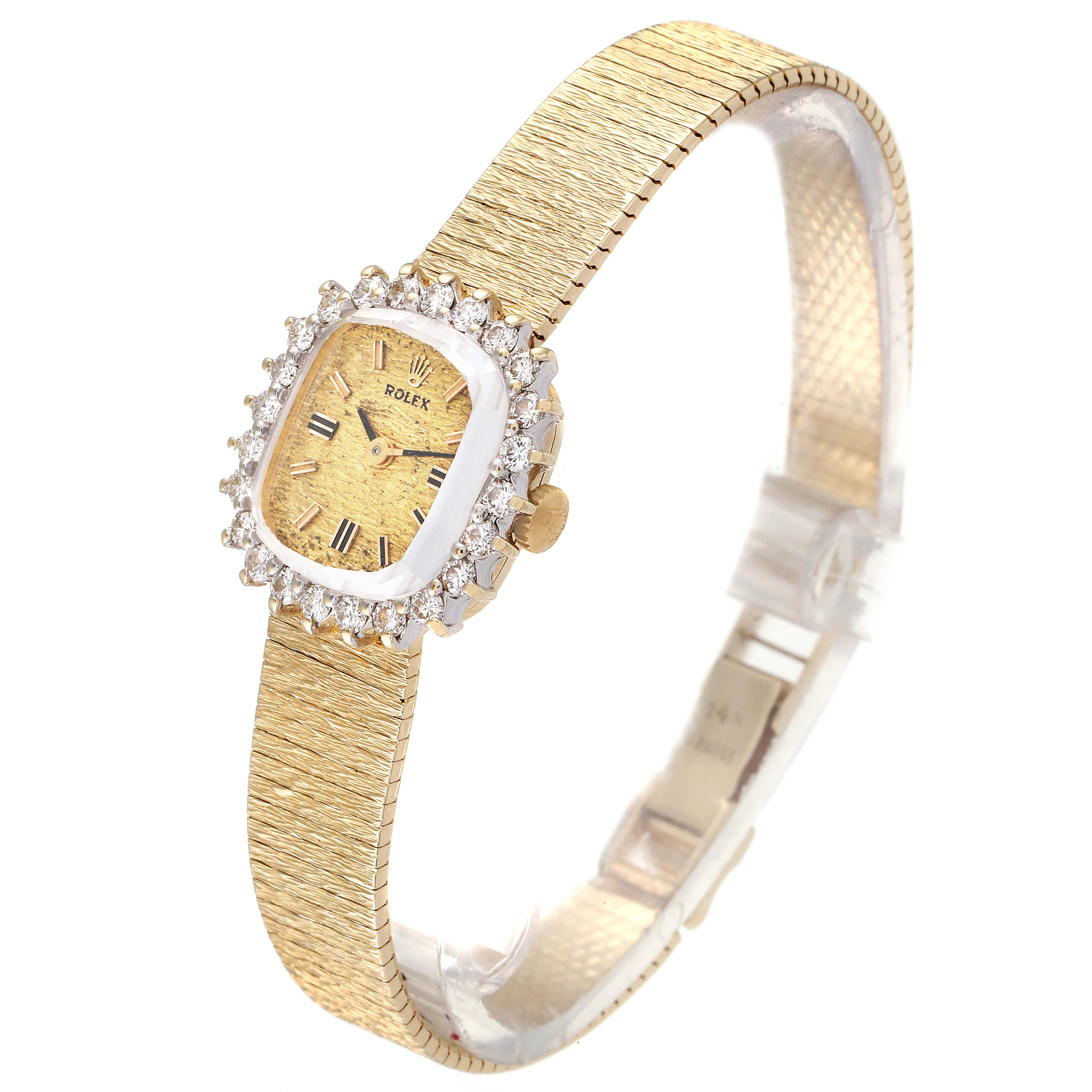 The image shows a Rolex Cocktail Women
s Yellow Gold Champagne Dial Women
s Yellow Gold Champagne Dial model watch from a slightly elevated angle, highlighting its face, bezel, and part of the bracelet.
