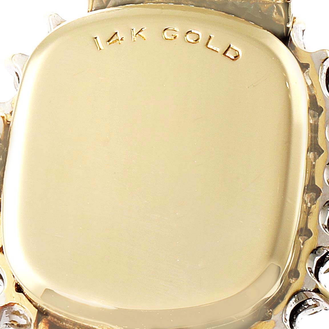 The image shows the back case of a Rolex Cocktail Women
s Yellow Gold Champagne Dial Women
s Yellow Gold Champagne Dial model watch, featuring a 14k gold marking.
