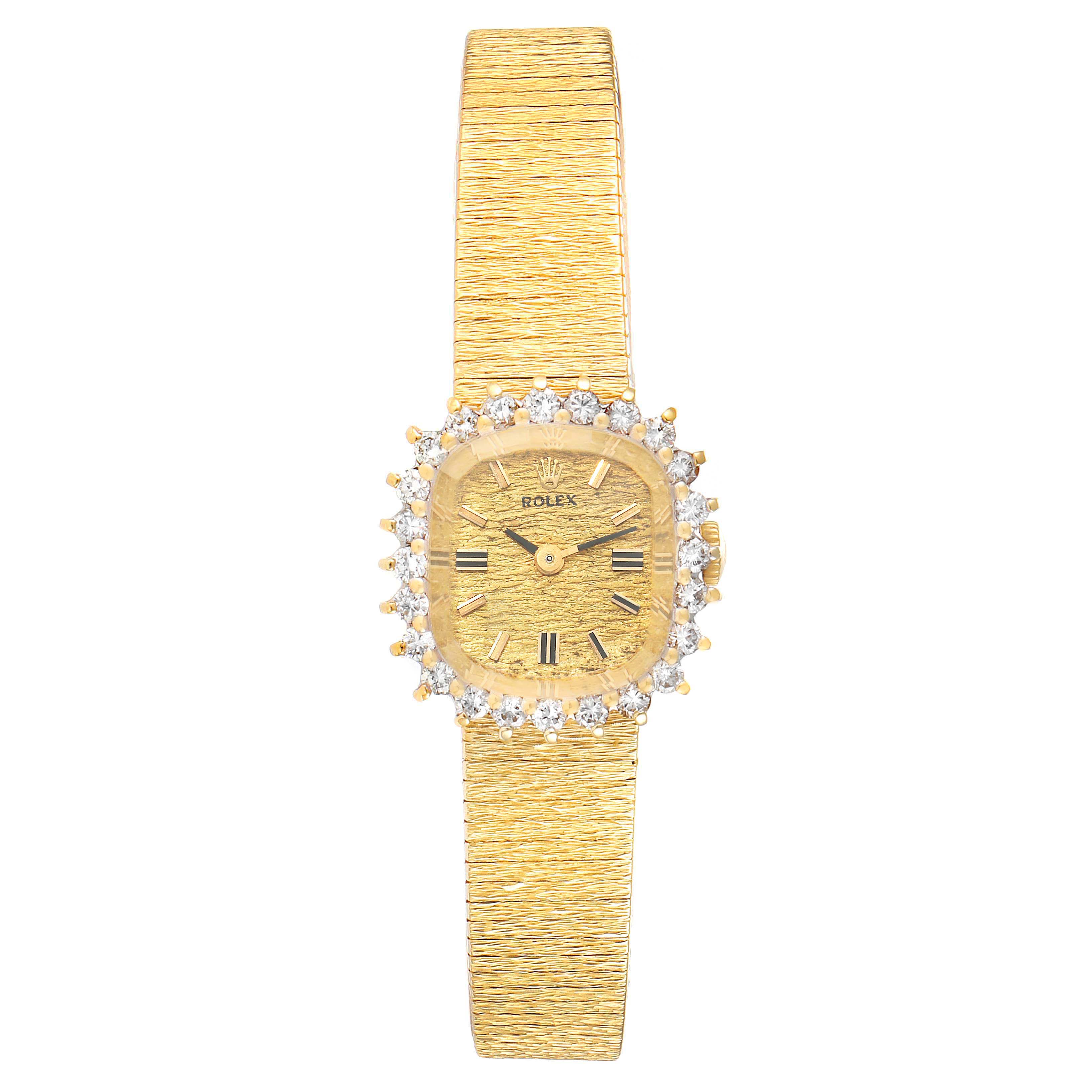 The Rolex Cocktail Women
s Yellow Gold Champagne Dial Women
s Yellow Gold Champagne Dial model watch is shown from a top-down angle, displaying the dial, bezel with diamonds, and textured gold bracelet.