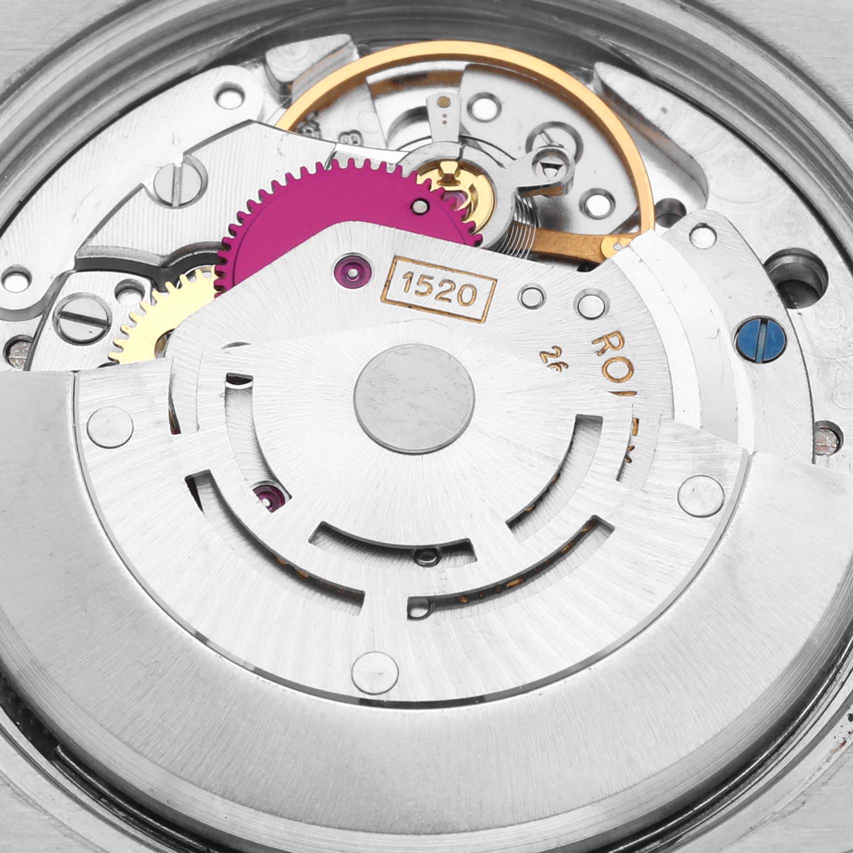 The image shows the intricate movement mechanism of a Rolex Vintage Collection 5701 Men's Steel and Gold (two tone) Silver Dial 5701 Men's Steel and Gold (two tone) Silver Dial watch, highlighting gears and engraved details.