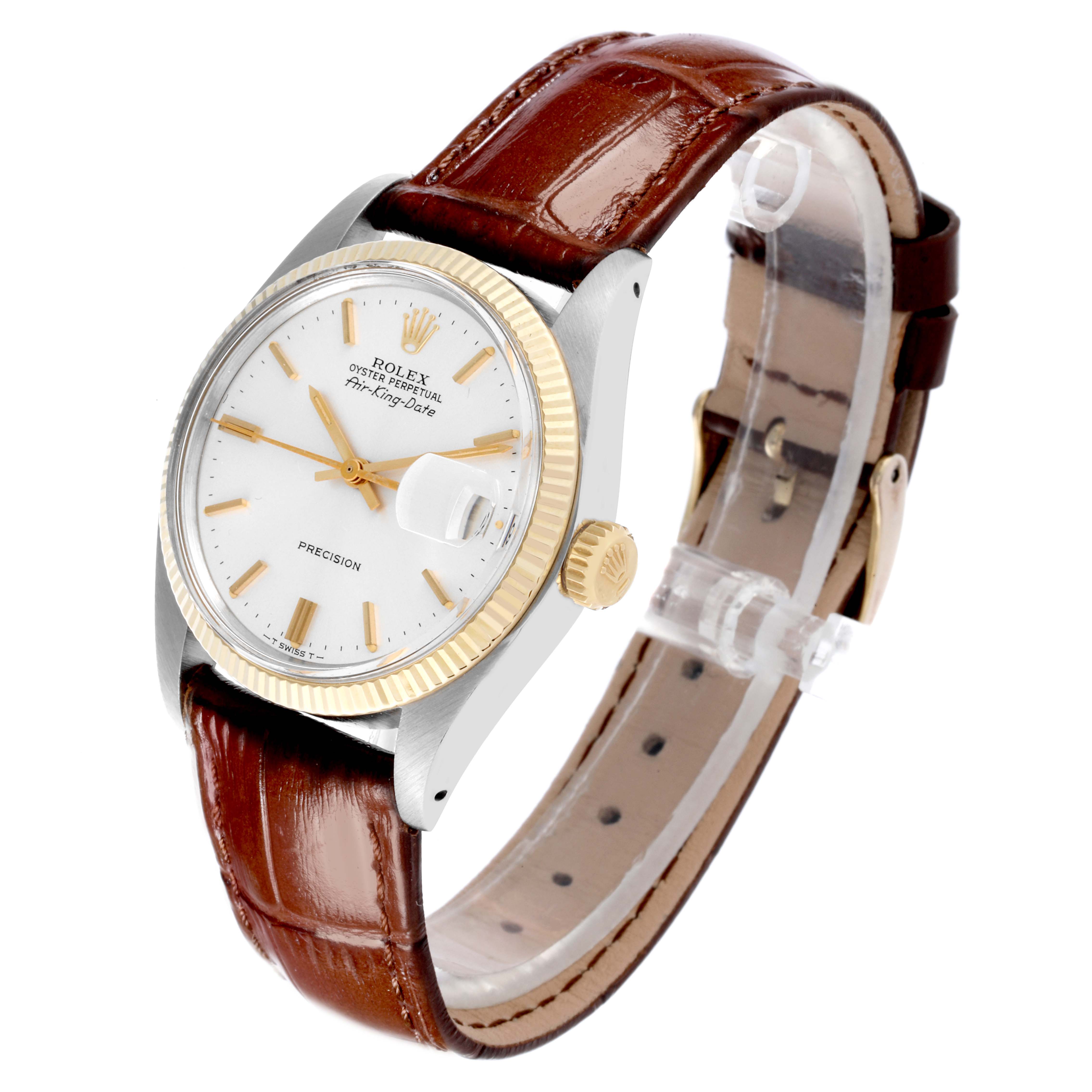 The Rolex Vintage Collection 5701 Men's Steel and Gold (two tone) Silver Dial 5701 Men's Steel and Gold (two tone) Silver Dial watch is shown at a three-quarter angle, highlighting the face, bezel, crown, and brown strap.