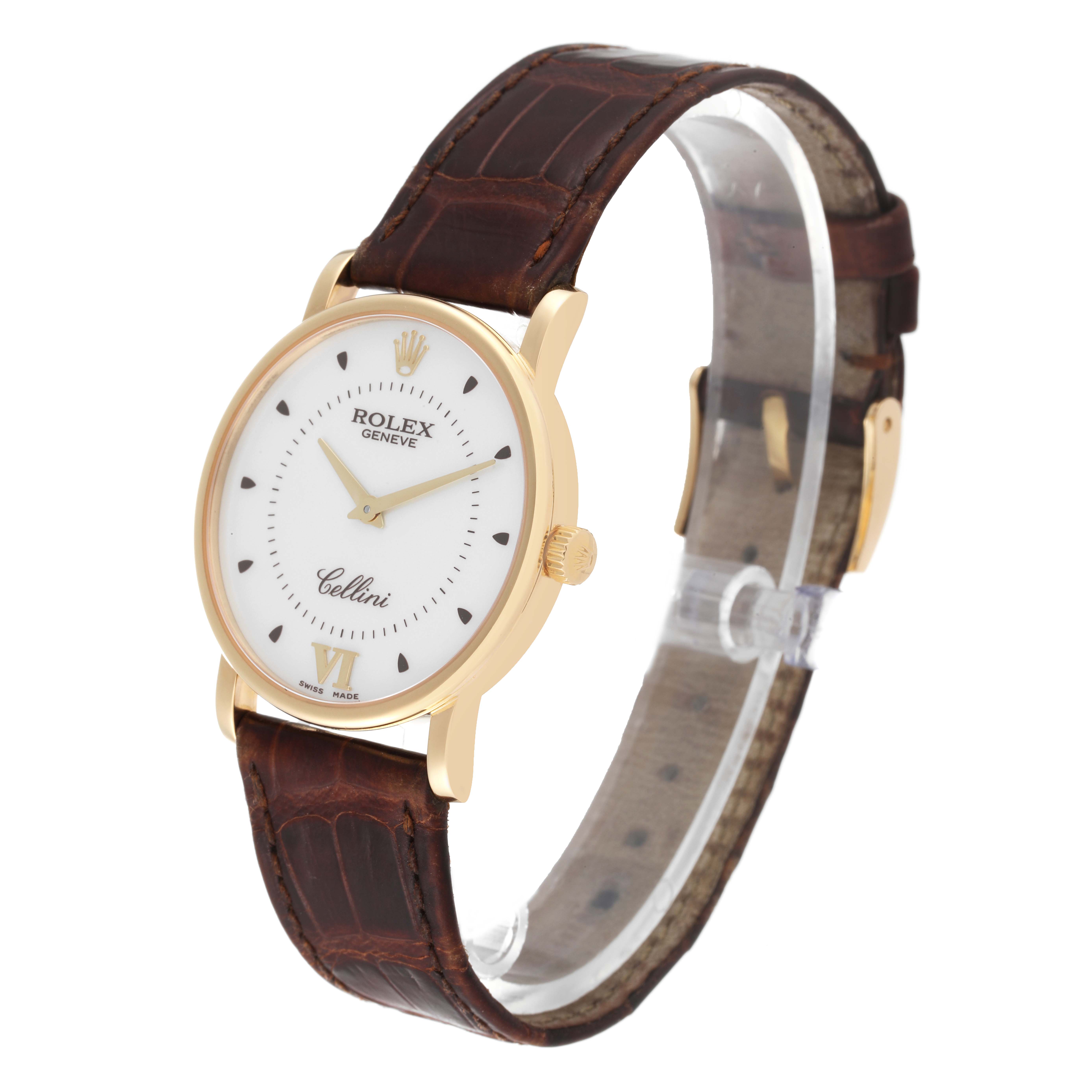 The image shows a Rolex Cellini 5115 Men's Yellow Gold Silver Dial 5115 Men's Yellow Gold Silver Dial watch at an angle highlighting the face, gold case, and brown leather strap.